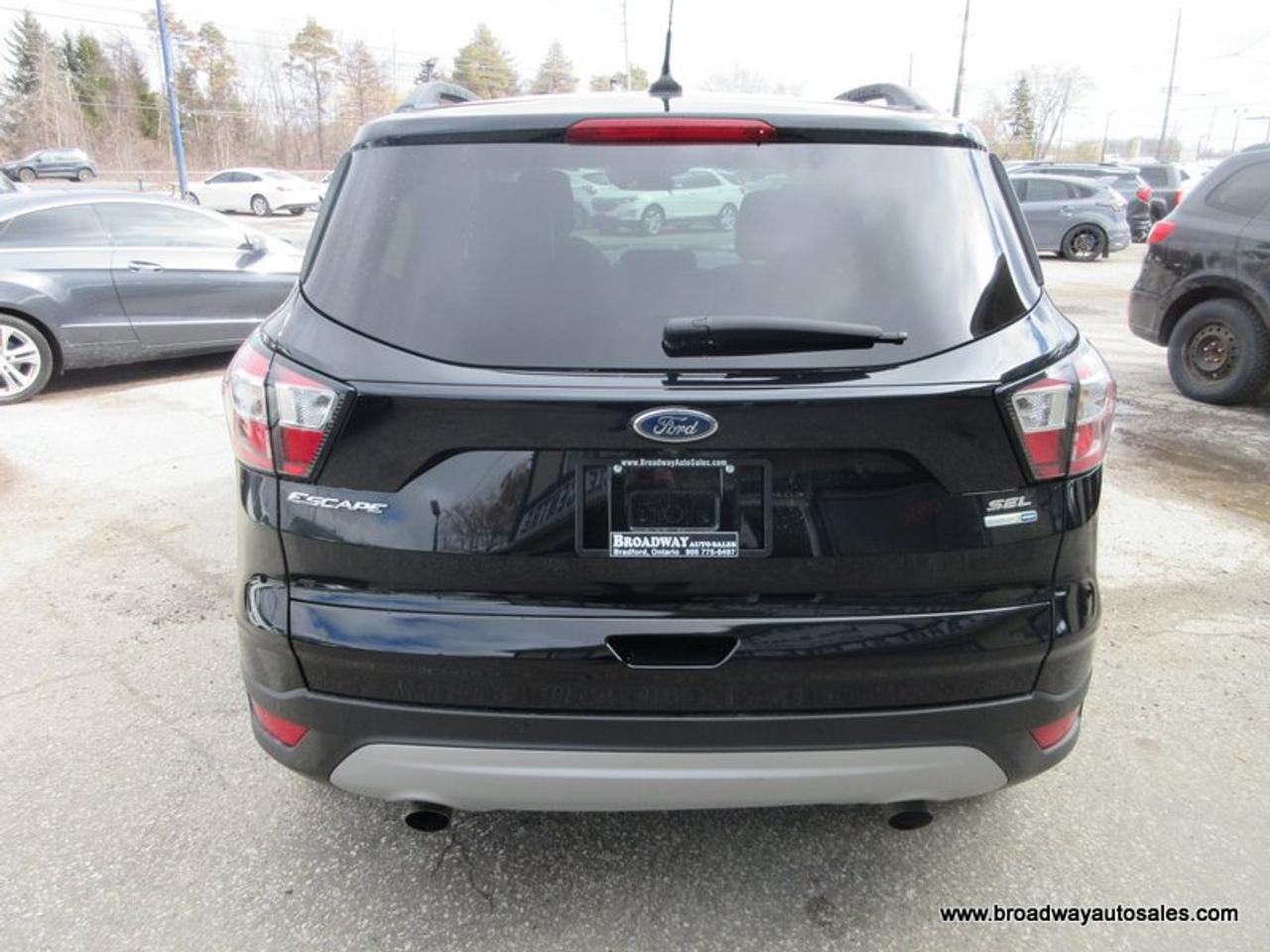 2018 Ford Escape FOUR-WHEEL DRIVE SEL-VERSION 5 PASSENGER 1.5L - ECO-BOOST.. NAVIGATION.. PANORAMIC SUNROOF.. LEATHER.. HEATED SEATS.. POWER TAILGATE.. Photo