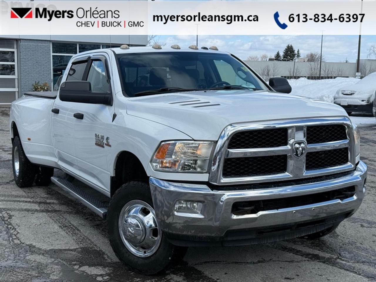 <b>SiriusXM,  Air Conditioning,  Power Doors!</b><br> <br>  On sale now! This vehicle was originally listed at $50938.  Weve marked it down to $48938. You save $2000.According to Edmunds, the Ram 3500 is a top pick for a heavy-duty truck thanks to its refined interior, forgiving ride, and tremendous towing and hauling capabilities. This 2015 Ram 3500 is for sale today in Orleans. <br> <br>This Ram 3500 Heavy Duty delivers exactly what you need: superior capability and exceptional levels of comfort, all backed with proven reliability and durability. Whether youre in the commercial sector or looking at serious recreational towing and hauling, this Ram 3500 is ready for the job. This sought after diesel Crew Cab 4X4 pickup has 107,931 km. Its White in colour. It has an Automatic transmission and is powered by a Cummins 385HP 6.7L Straight 6 Cylinder Engine. This vehicle has been upgraded with the following features: SiriusXM, Air Conditioning, Power Doors.<br> To view the original window sticker for this vehicle view this <a href=http://www.chrysler.com/hostd/windowsticker/getWindowStickerPdf.do?vin=3C63RRHL8FG661714 target=_blank>http://www.chrysler.com/hostd/windowsticker/getWindowStickerPdf.do?vin=3C63RRHL8FG661714</a>. <br/><br> <br>To apply right now for financing use this link: <a href=https://www.myersorleansgm.ca/FinancePreQualForm target=_blank>https://www.myersorleansgm.ca/FinancePreQualForm</a><br><br> <br/><br> Buy this vehicle now for the lowest bi-weekly payment of <b>$737.83</b> with $0 down for 36 months @ 10.99% APR O.A.C. ( Plus applicable taxes -  Plus applicable fees   ).  See dealer for details. <br> <br>*MYERS LIFETIME ENGINE AND TRANSMISSION COVERAGE CERTIFICATE NOT AVAILABLE ON VEHICLES WITH KMS EXCEEDING 140,000KM, VEHICLES 8 YEARS & OLDER, OR HIGHLINE BRAND VEHICLE(eg. BMW, INFINITI. CADILLAC, LEXUS...)<br> Come by and check out our fleet of 30+ used cars and trucks and 210+ new cars and trucks for sale in Orleans.  o~o