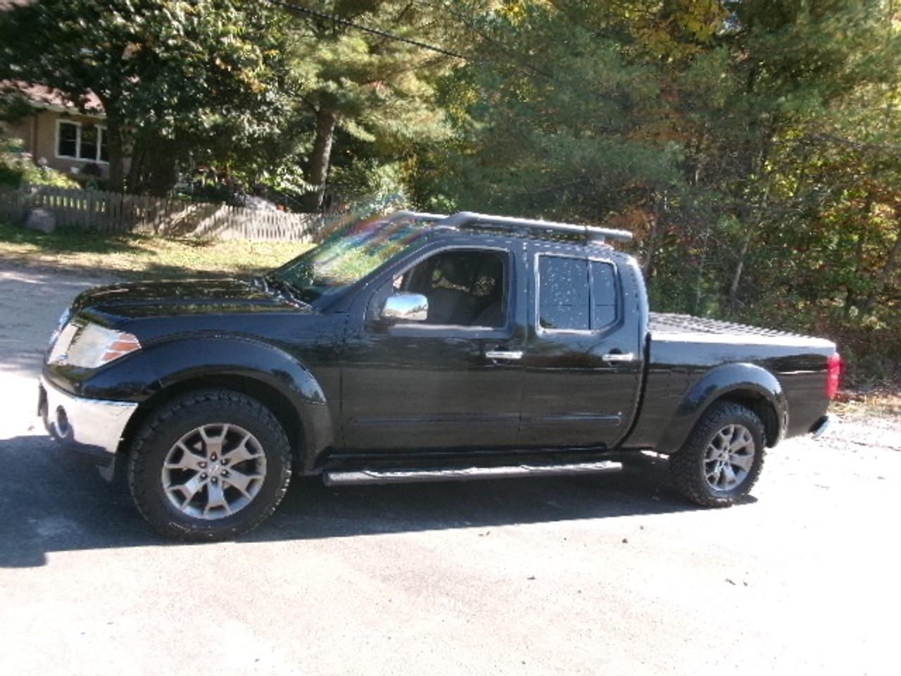 2015 Nissan Frontier SL Photo0