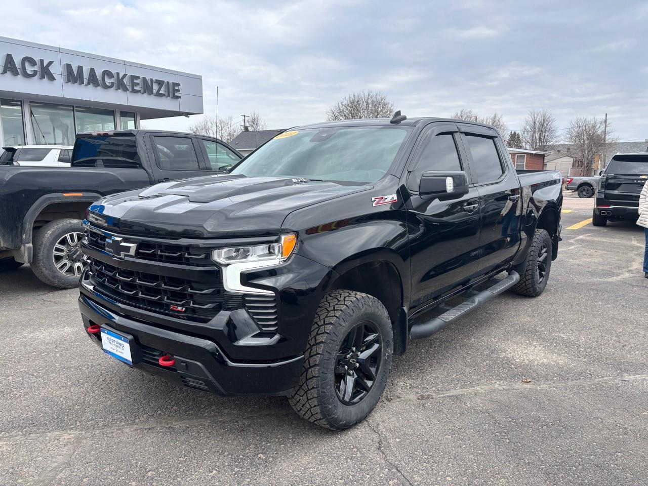 2022 Chevrolet Silverado 1500 LT Trail Boss Used 2022 Gas Powered 6.2L V8 Crew Cab 4X4 Truck with Factory 2 Lift Kit, Spray-In Bedliner, Leather Heated Front Seats, Heated Steering Wheel, Power Sunroof, and a 13.4 Diagonal Touchscreen Radio wit Photo