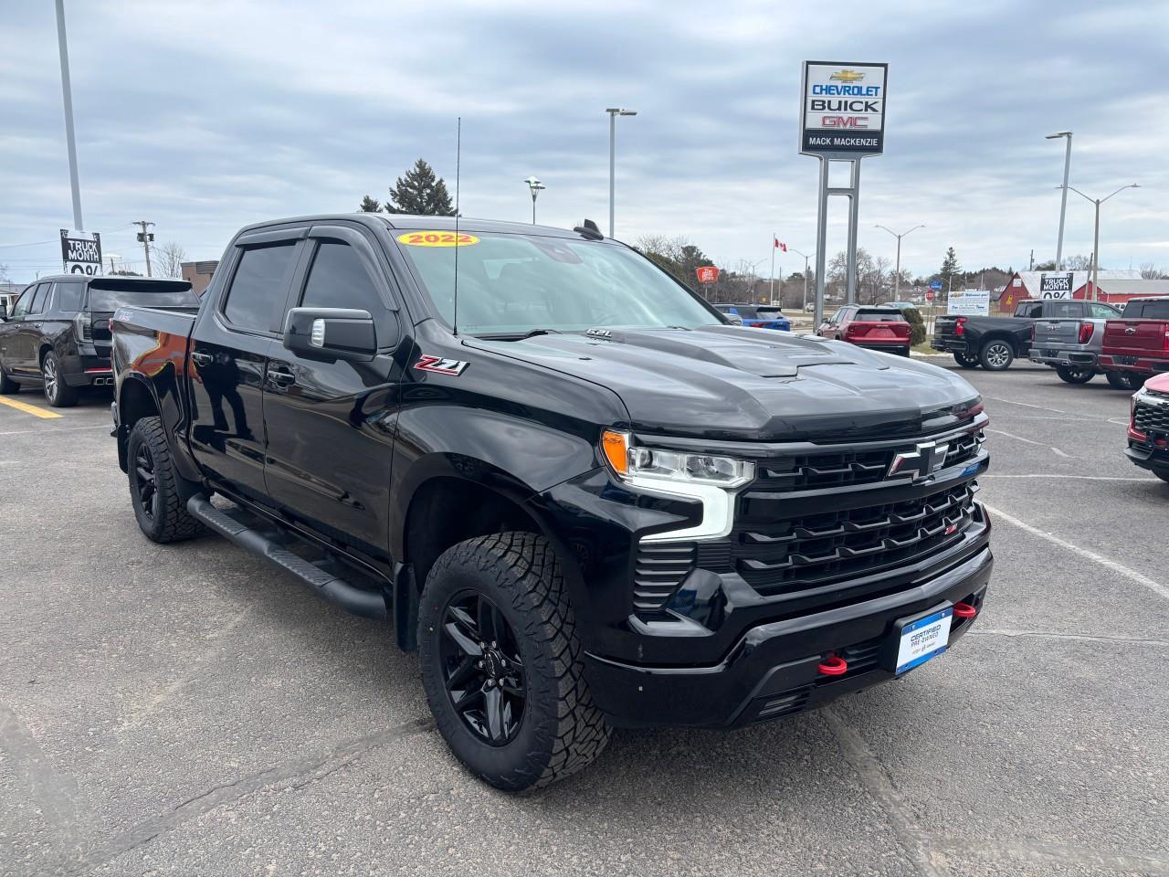 2022 Chevrolet Silverado 1500 LT Trail Boss Used 2022 Gas Powered 6.2L V8 Crew Cab 4X4 Truck with Factory 2 Lift Kit, Spray-In Bedliner, Leather Heated Front Seats, Heated Steering Wheel, Power Sunroof, and a 13.4 Diagonal Touchscreen Radio wit Photo