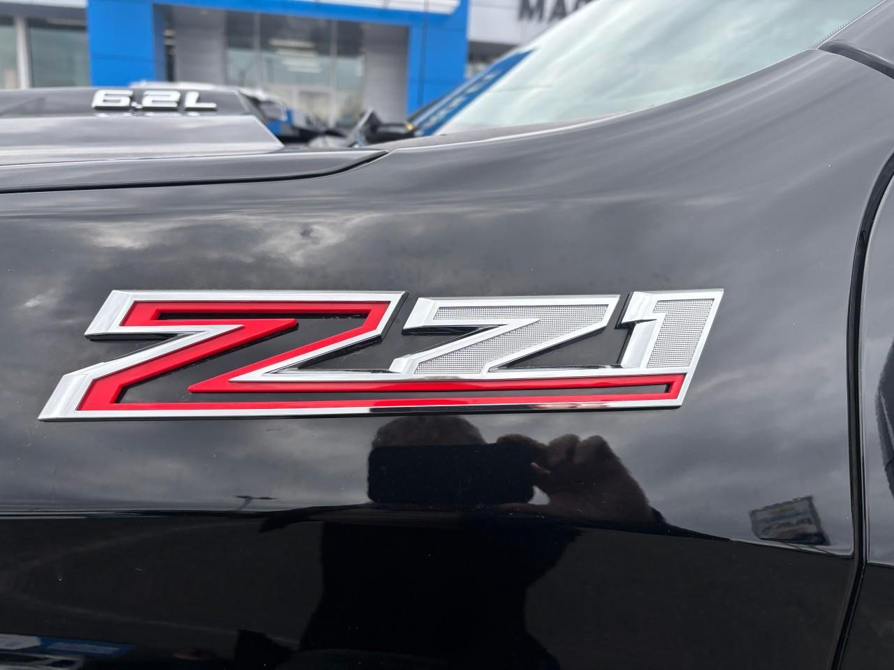 2022 Chevrolet Silverado 1500 LT Trail Boss Used 2022 Gas Powered 6.2L V8 Crew Cab 4X4 Truck with Factory 2 Lift Kit, Spray-In Bedliner, Leather Heated Front Seats, Heated Steering Wheel, Power Sunroof, and a 13.4 Diagonal Touchscreen Radio wit Photo