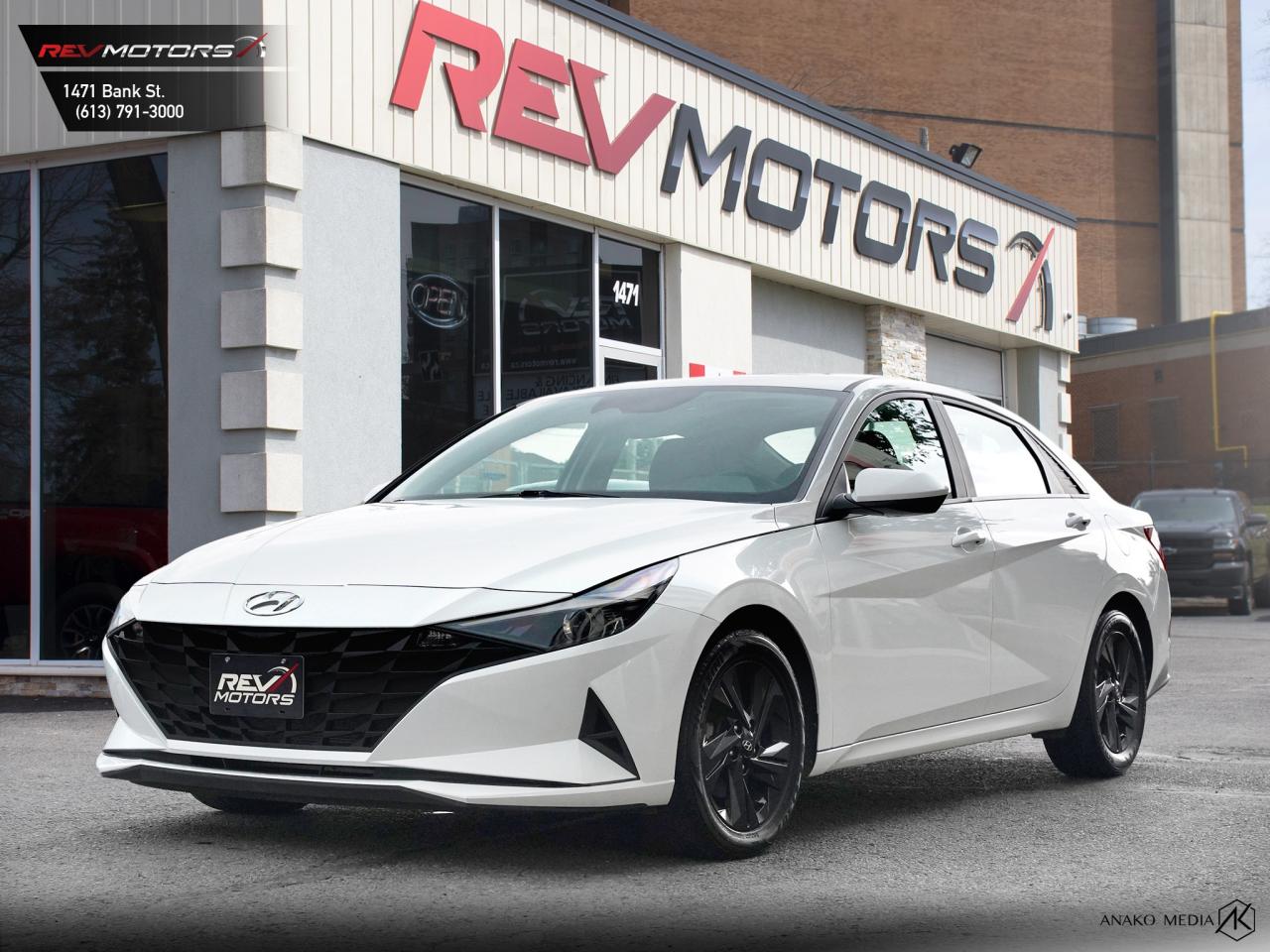 2021 Hyundai Elantra SEL | Apple CarPlay | Lane Assist | Heated Seats<br/> <br/> Quartz White Pearl Exterior | Black Cloth Interior | 16-Inch Alloy Wheels | Keyless Entry | Push Button Start | Hands-Free Smart Trunk | Heated Front Seats (available) | 8-Inch Touchscreen Display | Apple CarPlay® & Android Auto™ | Bluetooth® Connectivity | Blind Spot Collision-Avoidance Assist | Rear Cross-Traffic Alert | Lane Keeping Assist | Forward Collision-Avoidance Assist | Rearview Camera | Dual-Zone Automatic Climate Control | 2.0L 4-Cylinder Engine | 147 Horsepower | CVT Transmission | Front-Wheel Drive | 35 MPG Combined | and more. <br/> <br/> <br/> The 2021 Elantra SEL delivers a sleek, modern look with intuitive tech and safety features—making it a standout choice in the compact sedan class. <br/> <br/> <br/> Key Features: <br/> <br/> <br/> Striking Exterior: The white finish highlights the Elantra’s sharp lines, wide stance, and coupe-like silhouette for a clean, confident presence. <br/> <br/> <br/> Comfortable Interior: Inside, the black cloth seats and driver-focused layout offer a refined, spacious cabin with available heated front seats and dual-zone climate control. <br/> <br/> <br/> Smart Connectivity: The 8-inch touchscreen with Apple CarPlay® and Android Auto™ keeps you connected and entertained with ease. <br/> <br/> <br/> Efficient Performance: The 2.0L engine and CVT deliver smooth power and excellent fuel economy—up to 41 MPG on the highway. <br/> <br/> <br/> Confidence on the Road: Hyundai SmartSense includes blind spot monitoring, lane keeping assist, and forward collision avoidance to help keep you safe. <br/> <br/> <br/> This vehicle has travelled 136,631 Kms. <br/> <br/> <br/> *** NO additional fees except for taxes and licensing! *** <br/> <br/> <br/> *** 100-point inspection on all our vehicles & always detailed inside and out *** <br/> <br/> <br/> RevMotors is at your service to ensure you find the right car for YOU. Even if we do not have it in our inventory, we are more than happy to find you the vehicle that you are looking for. Give us a call at 613-791-3000 or visit us online at www.revmotors.ca <br/> <br/> <br/> Ça nous donnera du plaisir de vous servir en Français aussi! <br/> <br/> <br/> CERTIFICATION * All our vehicles are sold Certified for the province of Ontario (Quebec Safety Available, additional charges may apply) <br/> FINANCING AVAILABLE * RevMotors offers competitive finance rates through many of the major banks. Should you feel like youve had credit issues in the past, we have various financing solutions to get you on the road. We accept No Credit - New Credit - Bad Credit - Bankruptcy - Students and more!! <br/> EXTENDED WARRANTY * For your peace of mind, if one of our used vehicles is no longer covered under the manufacturer’s warranty, RevMotors will provide you with a 6 month / 6000KMS Limited Powertrain Warranty. You always have the options to upgrade to more comprehensive coverage as well. Well be more than happy to review the options and chose the coverage thats right for you! <br/> TRADES * Do you have a Trade-in? We offer competitive trade in offers for your current vehicle! <br/> SHIPPING * We can ship anywhere across Canada. Give us a call for a quote and we will be happy to help! <br/> <br/> <br/> Buy with confidence knowing that we always have your best interests in mind! <br/>