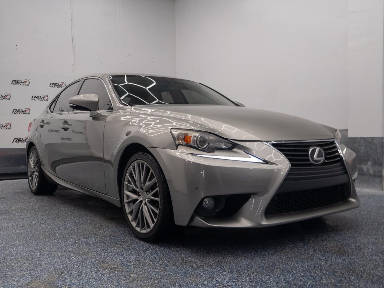 2014 Lexus IS 250 | AWD | Sedan | V6 | Certified Luxury<br/> <br/> Silver Exterior | Cream Leather Interior | All-Wheel Drive | Power Windows | Power Locks | Bluetooh <br/> <br/> <br/> Elegant, athletic, and refined — the 2014 Lexus IS 250 blends precision engineering with timeless design. With a smooth 2.5L V6 engine, luxurious cabin, and certified quality, this sedan is built to elevate every drive. <br/> <br/> <br/> Key Features: <br/> Sophisticated Style: The shimmering silver exterior pairs beautifully with the Cream leather interior, creating a clean and upscale aesthetic. Sleek lines, bold contours, and signature Lexus detailing give the IS 250 a poised and modern presence. <br/> <br/> <br/> Confident Performance: Powered by a 2.5L V6 engine and equipped with an automatic transmission, the IS 250 delivers smooth acceleration and responsive handling. All-Wheel Drive ensures stability and traction in all conditions — perfect for Canadian roads. <br/> <br/> <br/> Comfort & Craftsmanship: Inside, enjoy premium leather upholstery, ergonomic seating for five, and a thoughtfully designed cabin that prioritizes comfort. Dual-zone climate control and refined finishes make every journey a pleasure. <br/> <br/> <br/> Smart Functionality: From keyless entry to intuitive controls, the IS 250 offers convenience and connectivity. Whether commuting or cruising, this sedan keeps you in control with elegance. <br/> <br/> <br/> This Vehicle Has Travelled 167,669 Kms <br/> <br/> <br/> *** NO additional fees except for taxes and licensing! *** <br/> <br/> <br/> *** 100-point inspection on all our vehicles & always detailed inside and out *** <br/> <br/> <br/> RevMotors is at your service to ensure you find the right car for YOU. Even if we do not have it in our inventory, we are more than happy to find you the vehicle that you are looking for. Give us a call at 613-791-3000 or visit us online at www.revmotors.ca <br/> <br/> <br/> Ça nous donnera du plaisir de vous servir en Français aussi! <br/> <br/> <br/> CERTIFICATION * All our vehicles are sold Certified for the province of Ontario (Quebec Safety Available, additional charges may apply) <br/> FINANCING AVAILABLE * RevMotors offers competitive finance rates through many of the major banks. Should you feel like youve had credit issues in the past, we have various financing solutions to get you on the road. We accept No Credit - New Credit - Bad Credit - Bankruptcy - Students and more!! <br/> EXTENDED WARRANTY * For your peace of mind, if one of our used vehicles is no longer covered under the manufacturer’s warranty, RevMotors will provide you with a 6 month / 6000KMS Limited Powertrain Warranty. You always have the options to upgrade to more comprehensive coverage as well. Well be more than happy to review the options and chose the coverage thats right for you! <br/> TRADES * Do you have a Trade-in? We offer competitive trade in offers for your current vehicle! <br/> SHIPPING * We can ship anywhere across Canada. Give us a call for a quote and we will be happy to help! <br/> <br/> <br/> Buy with confidence knowing that we always have your best interests in mind! <br/>