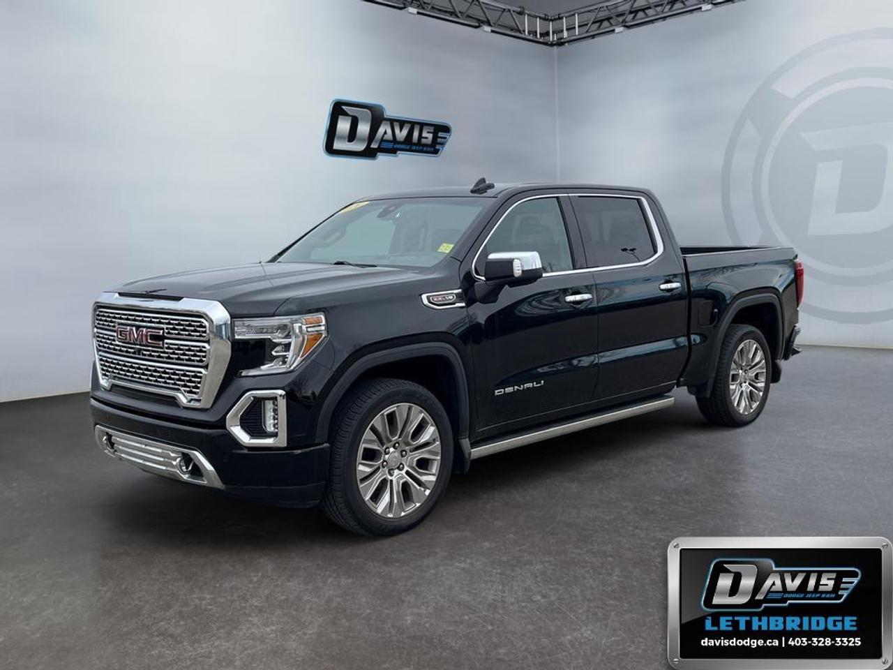 <b>Navigation, Wireless Charging, Leather Seats, Cooled Seats, Heated Seats!<br /> <br /></b><br /> This 2020 GMC Sierra 1500 Denali 4WD is the pinnacle of power and premium design, equipped with a commanding 6.2L EcoTec3 V8 engine paired to a smooth 10-speed automatic transmission. Built for performance and capability, it features the ProGrade Trailering System, integrated trailer brake controller, and Autotrac two-speed transfer case, making it ideal for towing and hauling with confidence. Finished in sleek Onyx Black, this Denali stands out with bold styling, chrome accents, and upgraded 22-inch polished aluminum wheels.<br /><br />Step inside to experience true luxury with perforated leather-appointed seating, heated and ventilated front seats, heated rear seats, and a heated leather-wrapped steering wheel. The cabin is loaded with advanced technology including an 8-inch GMC Infotainment system with navigation, Apple CarPlay, Android Auto, wireless charging, and a premium Bose sound system. Additional highlights like a power sunroof, head-up display, rear camera mirror, and dual-zone climate control ensure comfort and convenience on every drive.<br /><br />Safety and innovation come standard with advanced features such as HD Surround Vision, forward collision alert, lane keep assist, front and rear park assist, and blind zone monitoring. The signature MultiPro tailgate, spray-in bedliner, power steps, and bed-mounted 120V outlet enhance both functionality and ease of use. This Sierra Denali delivers a perfect combination of luxury, strength, and cutting-edge technologyideal for drivers who want it all.<br /> <br />To apply right now for financing use this link: <a href=https://lethbridge.davisdodge.ca/free-credit-check/ target=_blank rel=nofollow noopener noreferrer>https://lethbridge.davisdodge.ca/free-credit-check/</a><br /> <br /><br />Locally Owned & Trusted for Over 35 Years  Davis Dodge in Lethbridge, AB <br /><br /> At Davis Dodge, weve proudly served the Lethbridge community for more than 35 years, offering an unparalleled car buying experience. Dont just take our word for itour Google reviews speak volumes about our commitment to exceptional service. <br /><br /> Delivery & At-Home Test Drives: Convenient options to suit your lifestyle. <br /><br /> Flexible Financing for Everyone: Get the vehicle you need with financing solutions tailored to your situation. <br /><br /> Full Mechanical Inspections & Professional Cleaning: Every vehicle is thoroughly inspected and cleaned before it hits our lot.<br /><br /> We take all makes and models on trade and offer competitive pricing with inventory that changes daily. Whether you're shopping for a Chrysler, Dodge, Jeep, RAM, or FIAT, our AMVIC Licensed dealership makes it easy to browse, buy, and drive away.<br /><br /> Located in Lethbridge, AB, we proudly serve customers in Fort Macleod, Taber, Claresholm, and Coaldale. Shop online or visit us today to experience the best in sales, service, and selection. Standard bank rates apply; taxes are additional.<br /><br /> Vehicle pricing offer shown expires 2026-07-31. <br /> Come by and check out our fleet of 50+ used cars and trucks and 110+ new cars and trucks for sale in Lethbridge. o~o