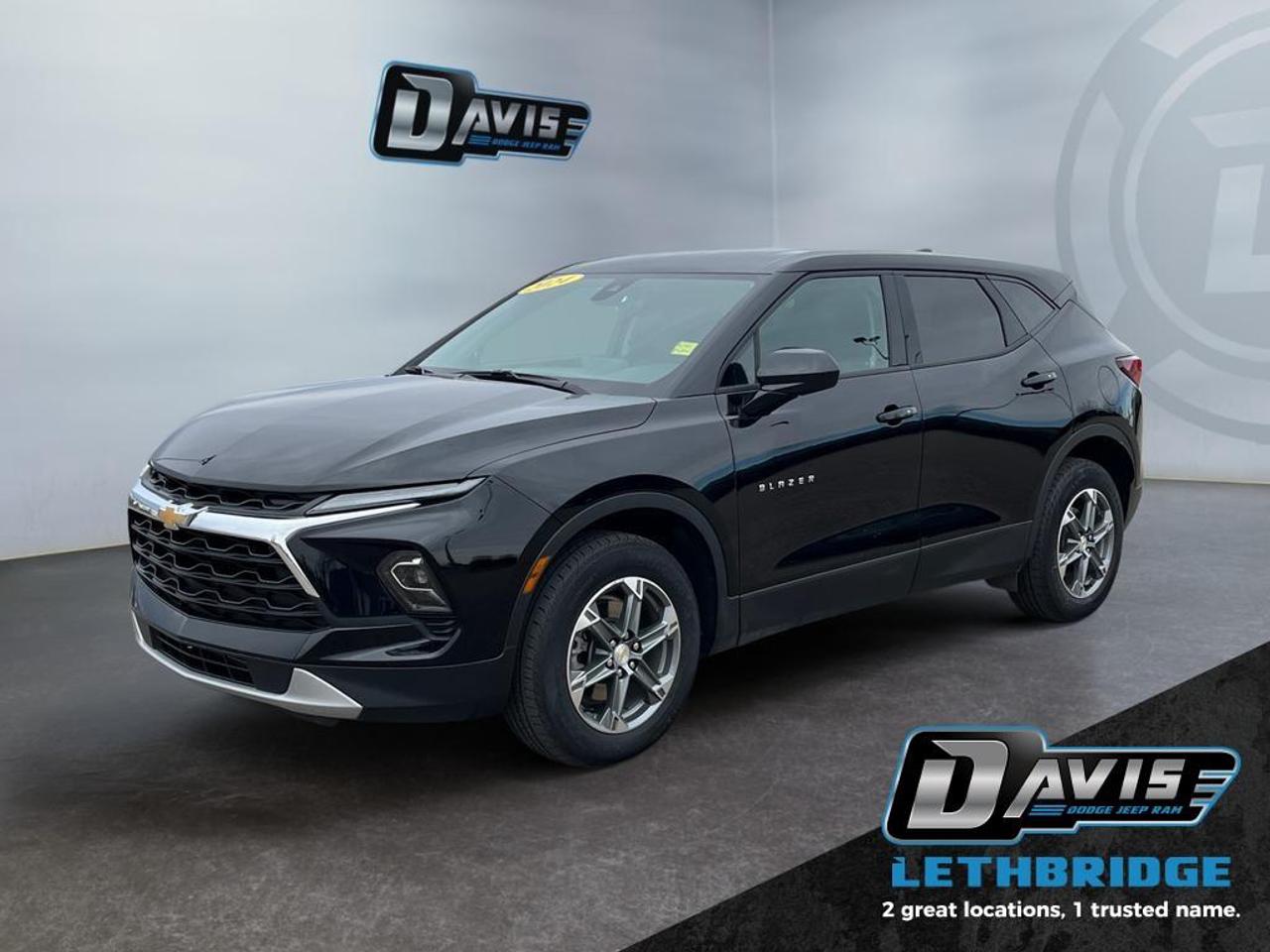 <b>Low Mileage, Heated Seats, Apple CarPlay, Android Auto, Lane Keep Assist, Lane Departure Warning!<br /> <br /></b><br /> This 2024 Chevrolet Blazer LT AWD delivers a bold combination of sporty design, advanced technology, and everyday versatility. Powered by a responsive 2.0L turbocharged engine paired with a smooth 9-speed automatic transmission, this all-wheel drive SUV offers confident performance in all conditions. With features like remote start, driver mode selector, and a factory trailering package, the Blazer LT is built to handle both city driving and weekend adventures with ease.<br /><br />Inside, enjoy a modern and connected cabin featuring a 10.2-inch Chevrolet Infotainment 3 Plus touchscreen with wireless Apple CarPlay and Android Auto, Bluetooth streaming, and available Wi-Fi hotspot capability. Comfort is front and center with heated front seats, dual-zone automatic climate control, an 8-way power driver seat, and keyless open and start. The sleek Jet Black/Medium Grey interior is complemented by active noise cancellation for a quieter, more refined ride.<br /><br />Safety comes standard with Chevrolet Safety Assist, including automatic emergency braking, forward collision alert, lane keep assist, and front pedestrian braking. Additional highlights include a rear vision camera, IntelliBeam automatic high beams, LED lighting, and 18-inch aluminum wheels. This 2024 Blazer LT AWD is a smart, stylish SUV designed for modern drivers seeking performance, safety, and connectivity.<br /> <br />To apply right now for financing use this link: <a href=https://lethbridge.davisdodge.ca/free-credit-check/ target=_blank rel=nofollow noopener noreferrer>https://lethbridge.davisdodge.ca/free-credit-check/</a><br /><br /> <br /><br />Locally Owned & Trusted for Over 35 Years  Davis Dodge in Lethbridge, AB <br /><br /> At Davis Dodge, weve proudly served the Lethbridge community for more than 35 years, offering an unparalleled car buying experience. Dont just take our word for itour Google reviews speak volumes about our commitment to exceptional service. <br /><br /> Delivery & At-Home Test Drives: Convenient options to suit your lifestyle. <br /><br /> Flexible Financing for Everyone: Get the vehicle you need with financing solutions tailored to your situation. <br /><br /> Full Mechanical Inspections & Professional Cleaning: Every vehicle is thoroughly inspected and cleaned before it hits our lot.<br /><br /> We take all makes and models on trade and offer competitive pricing with inventory that changes daily. Whether you're shopping for a Chrysler, Dodge, Jeep, RAM, or FIAT, our AMVIC Licensed dealership makes it easy to browse, buy, and drive away.<br /><br /> Located in Lethbridge, AB, we proudly serve customers in Fort Macleod, Taber, Claresholm, and Coaldale. Shop online or visit us today to experience the best in sales, service, and selection. Standard bank rates apply; taxes are additional.<br /><br /> Vehicle pricing offer shown expires 2026-04-30. <br /> Come by and check out our fleet of 70+ used cars and trucks and 110+ new cars and trucks for sale in Lethbridge. o~o