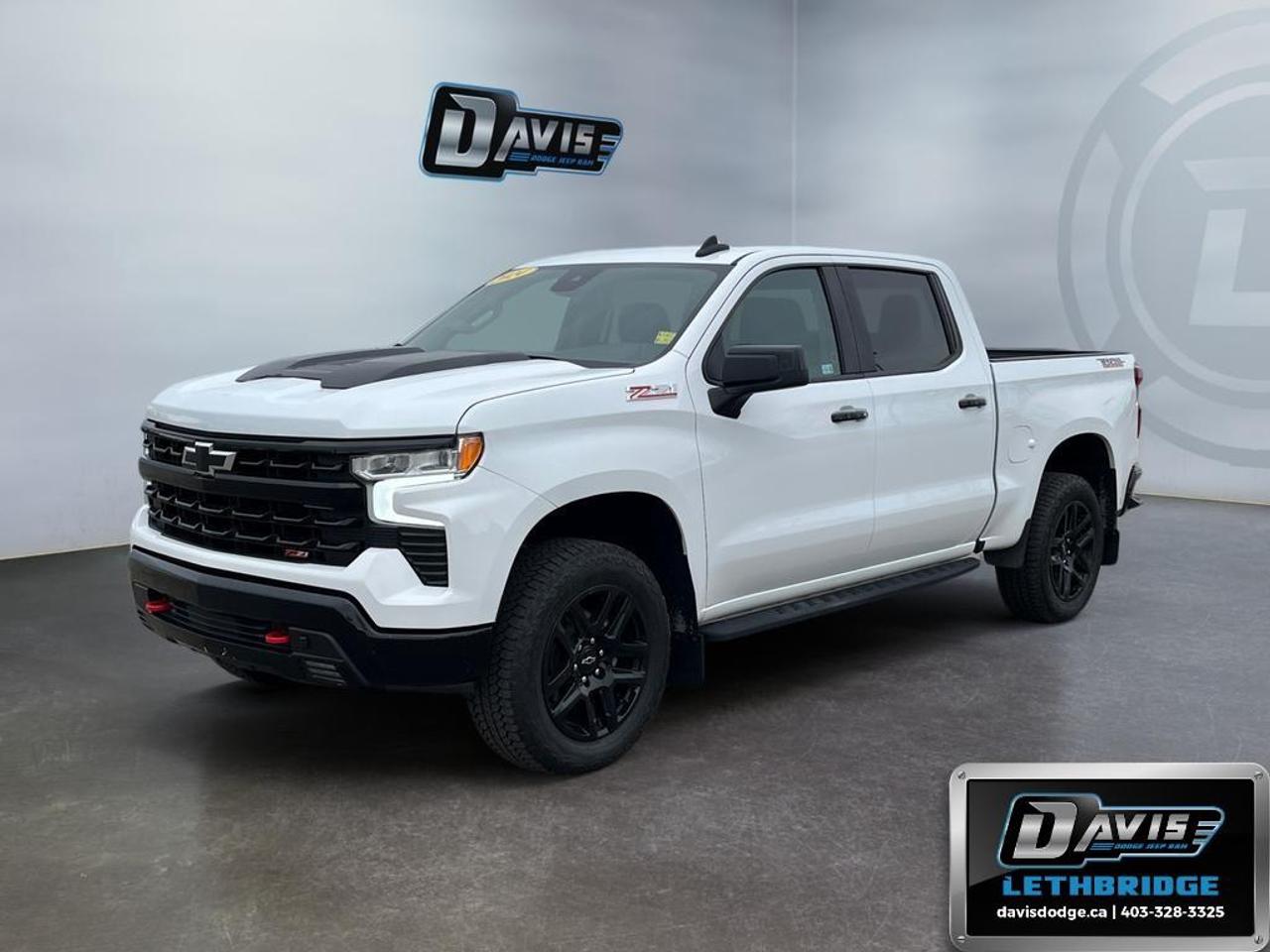 <p>Introducing the <strong>2024 Chevrolet Silverado 1500 LT Trail Boss Crew Cab Short Box 4-Wheel Drive</strong>, your ideal companion for both adventure and daily drives. Its pristine <strong>white</strong> exterior complements the rugged 4x4 drivetrain, offering exceptional handling both on and off the road.</p><p><strong>Exterior Features:</strong></p><ul><li>LED Lights enhance visibility and style</li><li>Alloy Wheels provide durability and a modern look</li><li>Trail-ready Z71 Package</li></ul><p><strong>Interior Features:</strong></p><ul><li>Luxurious black interior with heated seats</li><li>Spacious cabin with comfortable seating</li><li>Convenient keyless entry and power windows</li></ul><p><strong>Technology & Safety Features:</strong></p><ul><li>Backup Camera for added convenience</li><li>Smart Device Integration and Wi-Fi Hotspot keep you connected</li><li>Safety features include lane assist and remote start</li></ul><p>This truck is perfect for those who seek the thrill of the trail or the comfort of a tech-savvy ride. Take the next step and contact Davis Dodge Lethbridge for more information on this incredible vehicle!</p>