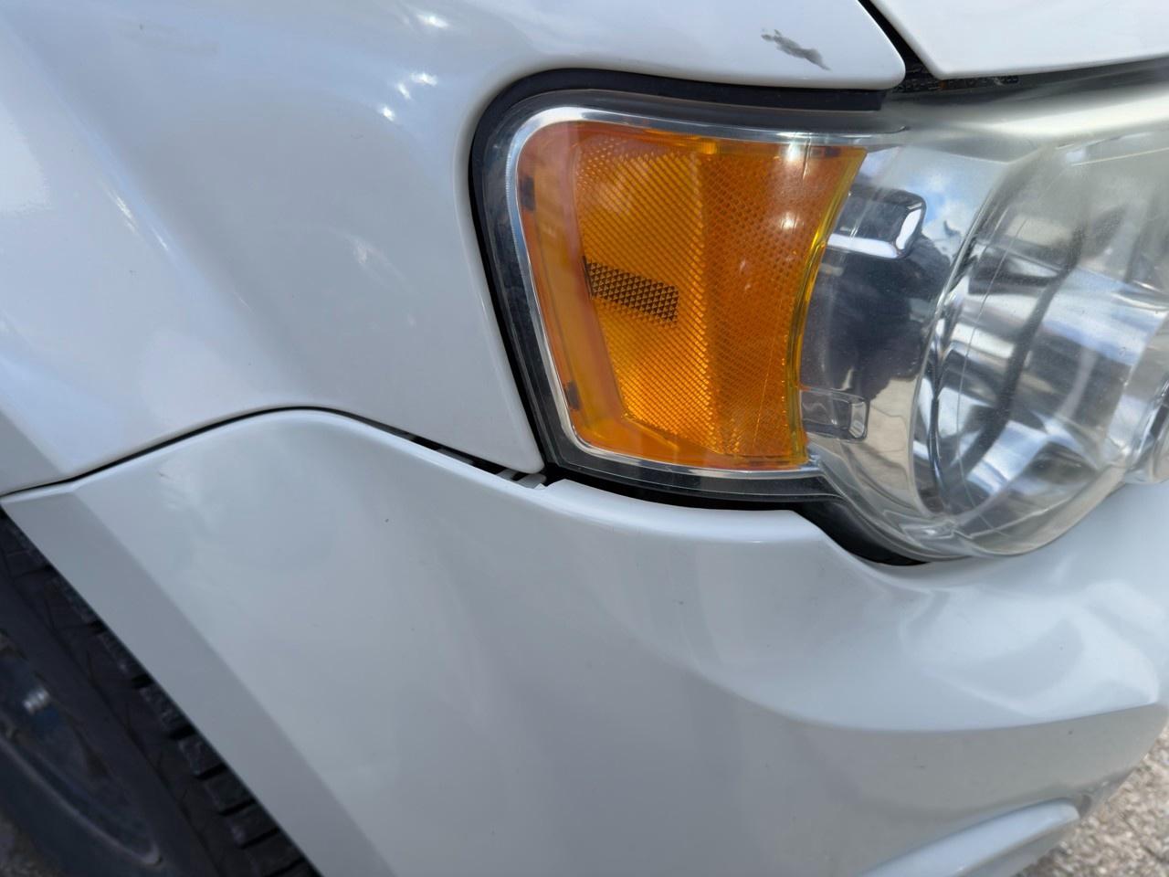 2011 Ford Escape Limited INCOMING|WHITE SUEDE|BLACK LEATHER|3.0L V6|VOICE ACTIVATED TOUCH-SCREEN NAVIGATION Photo