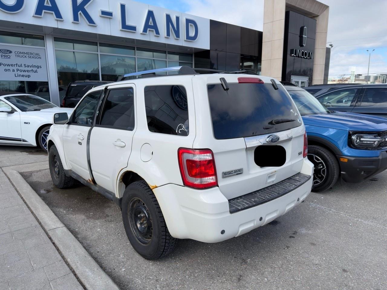 2011 Ford Escape Limited INCOMING|WHITE SUEDE|BLACK LEATHER|3.0L V6|VOICE ACTIVATED TOUCH-SCREEN NAVIGATION Photo