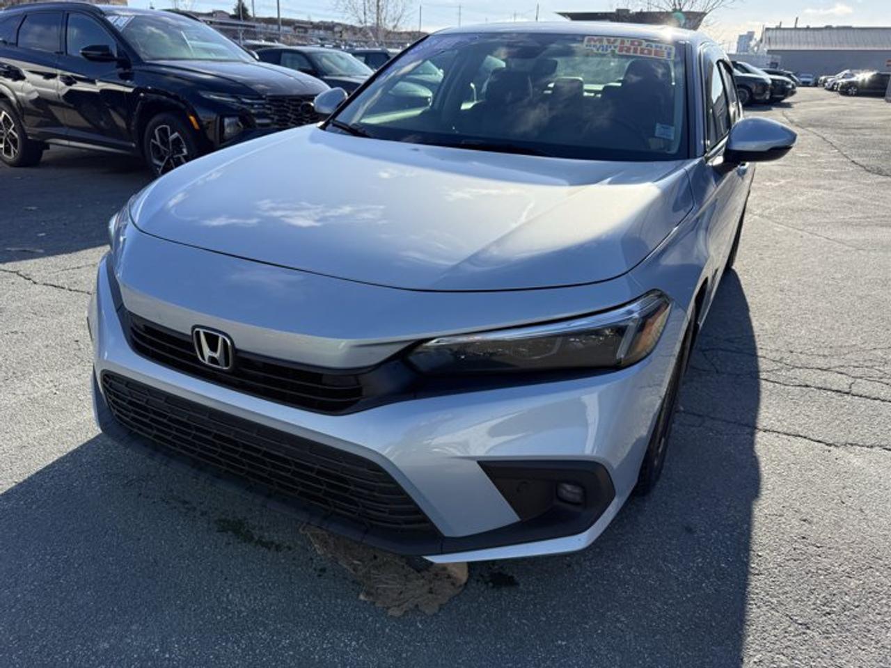 FRESH 2 YEAR MVI!Steele Hyundai MVI and Ride. All MVI and Ride vehicles have been inspected and brought up to provincial motor vehicle inspection standards.We also change the oil as part of our process to get this vehicle ready for you.Warranty: There is a 30-day 50/50 split warranty on parts and labor on any motor vehicle inspection items.Please note items such as air conditioning & engine lights are not MVI related items.TRADE INS ARE WELCOME.The 2022 Honda Civic Touring delivers premium comfort, advanced technology, and refined performance in a sleek, modern package. As the top trim in the Civic lineup, the Touring model features a turbocharged 1.5liter engine producing smooth, responsive power while maintaining impressive fuel efficiency. Its exterior design stands out with LED headlights, 18inch alloy wheels, and a streamlined body that blends sportiness with sophistication.Inside, the Civic Touring offers an upscale cabin with leather trimmed seats, a power-adjustable drivers seat, and a spacious, well designed interior focused on driver comfort. The 9inch touchscreen with built in navigation, wireless Apple CarPlay and Android Auto, wireless charging, and a premium Bose 12speaker audio system elevate the driving experience with modern convenience and high-quality sound.Safety is a priority with Honda Sensing standard, including adaptive cruise control, lane-keeping assist, blind spot information, and collision mitigation braking. With a smooth ride, advanced features, and a stylish look, the 2022 Honda Civic Touring is ideal for drivers seeking a reliable, luxurious, and tech-forward compact sedan.