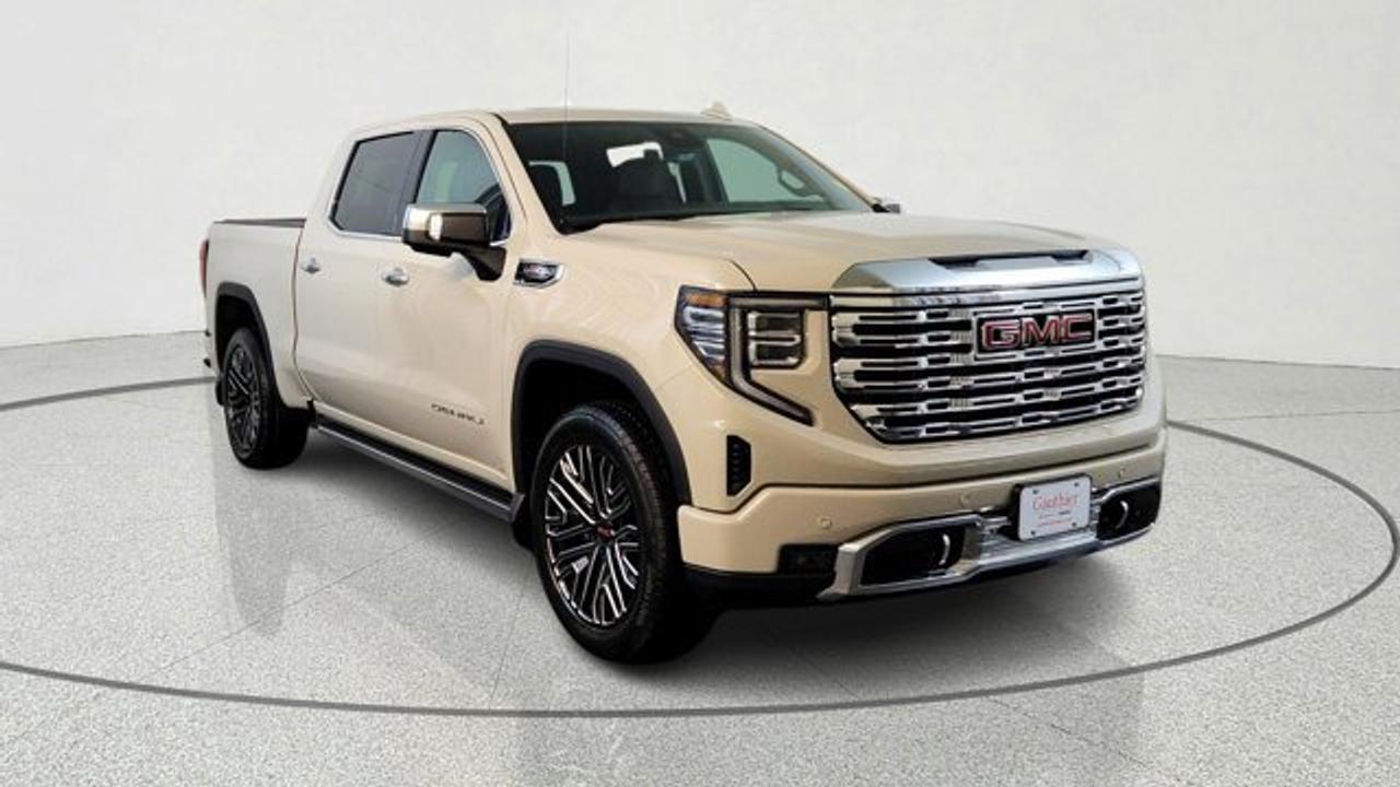 The 2026 GMC Sierra 1500 Denali with the 6.2-L EcoTec3 V8 delivers impressive performance, producing about 420 horsepower and 460 lb-ft of torque, paired with a 10-speed automatic transmission and featuring Dynamic Fuel Management for efficiency and strength. With the Denali Reserve Super Cruise Package, a sunroof, MultiPro power steps, a technology package including a rear-camera mirror and 15-inch multicolor head-up display and SuperCruise handsfree driving are included. Visually and in ride presence, the 22-inch painted aluminum wheels with machining and bright chrome inserts set this trim apart, and the Jet Black Forge perforated leather interior with heated/ventilated front seats, as well as many comfort and driver assistance features rounds out the premium experience.