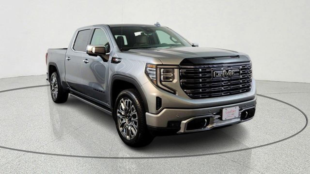 The 2026 GMC Sierra 1500 Denali Ultimate stands at the pinnacle of truck luxury. Power is delivered from a 6.2-liter V8 paired with a smooth 10-speed automatic transmission on 22-inch wheels. Inside, the cabin is a technology-rich sanctuary featuring 16-way heated, ventilated, and massaging leather seats, a high-resolution 13.4-inch infotainment screen with wireless smartphone integration, a 12-speaker Bose surround sound system, Super Cruise hands-free driving, and a multicolor head-up display---all enveloped in premium materials like full-grain leather, open-pore wood, and acoustic glass. A black GMC badging package rounds out the look.