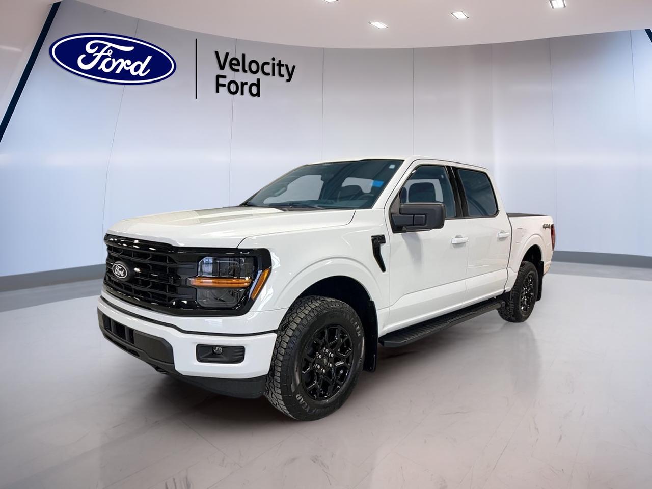 Built for work, family life, and weekend escapes, this brand new 2026 Ford F-150 XLT 4WD SuperCrew 5.5 Box delivers the capability Canadians expect with smart everyday comfort. Finished in White with a Black interior, this four-door pickup pairs a 2.7-litre unleaded engine with an automatic transmission for smooth, confident driving in Moose Jaw.

FEATURES OF THE F-150 XLT 4WD SuperCrew 5.5 Box
»» SuperCrew cab adds roomy rear seating
»» 5.5-foot box supports daily hauling needs
»» Four-wheel drive boosts all-season traction
»» XLT trim balances value and utility

TRUCK FEATURES
»» Towing capacity rated at 4,671 kg
»» Rear tow hook adds recovery support
»» Off-road tires aid rough surface grip
»» Spare tire helps during roadside issues

ADVANCED SAFETY FEATURES
»» Backup camera helps with reversing visibility
»» Blind spot monitor supports lane awareness
»» Lane departure warning adds extra confidence
»» Side and head airbags enhance protection

The 2026 Ford F-150 XLT 4WD SuperCrew 5.5 Box gives you practical safety for busy roads and job sites. Anti-Lock Braking System, stability control, child safety locks, passenger airbag sensor, and automatic door locks help support peace of mind during daily travel.

PERFORMANCE AND EFFICIENCY
»» 2.7-litre unleaded engine balances power efficiently
»» Automatic transmission delivers smooth gear changes
»» Dual shift mode adds driver control
»» Power steering supports easy manoeuvring daily

The 2026 Ford F-150 XLT 4WD SuperCrew 5.5 Box is ready for changing prairie weather with four-wheel drive and steady road manners. It is well suited to commuting, towing, and light off-road use while keeping operation simple and responsive.

COMFORT AND CONVENIENCE
»» Cruise control supports relaxed highway driving
»» Front air conditioning keeps cabin comfortable
»» Driver lumbar support aids long trips
»» Heated mirrors help in winter weather

Inside, the 2026 Ford F-150 XLT 4WD SuperCrew 5.5 Box offers useful comfort for both driver and passengers. Power windows, electric mirrors, an adjustable steering wheel, rear window defroster, tinted windows, and illuminated vanity mirrors add convenience to everyday use.

TECHNONOLGY AND CONNECTIVITY
»» Bluetooth integration supports hands-free phone use
»» WiFi hotspot keeps devices connected
»» Satellite radio expands entertainment choices
»» Steering wheel audio controls add ease

The 2026 Ford F-150 XLT 4WD SuperCrew 5.5 Box keeps key controls close at hand. Automatic headlights and LED headlamps improve visibility, while simple in-cabin tech helps make every drive easier, whether you are heading across town or out beyond the city.

CARGO SPACE
»» 5.5-foot box handles everyday cargo tasks
»» Rear trunk access supports quick loading
»» Four-door cabin adds flexible storage options
»» SuperCrew layout helps carry gear inside

This truck is designed to handle tools, supplies, and weekend gear with ease. The short box is practical for urban parking while still offering useful bed space, and the roomy cabin gives you added flexibility when the weather calls for protected interior storage.

WHAT OTHER OWNERS LIKE
»» Smooth ride for a full-size truck
»» Strong everyday capability with useful towing
»» Spacious rear seating for family use
»» User-friendly controls and practical technology

This 2026 Ford F-150 XLT 4WD SuperCrew 5.5 Boxs VIN is: 1FTEW3LP1TKD58764.