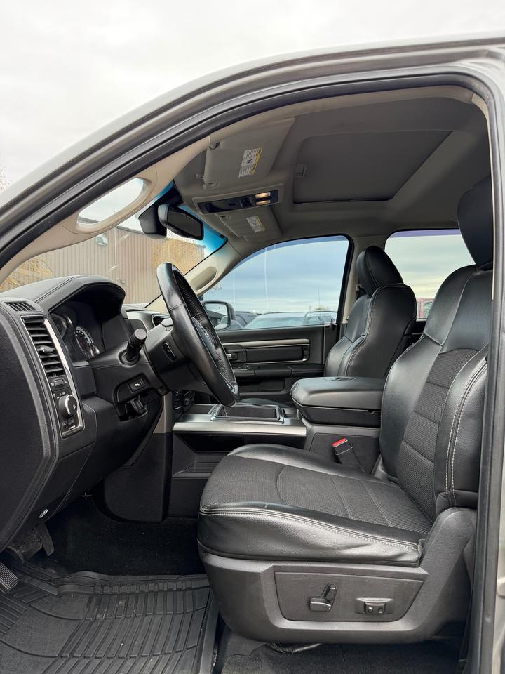 2013 RAM 1500 4WD Crew Cab 140.5" Sport 5.7L V8 Photo