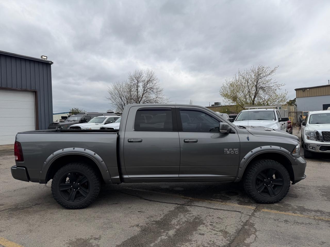 2013 RAM 1500 4WD Crew Cab 140.5" Sport 5.7L V8 Photo4