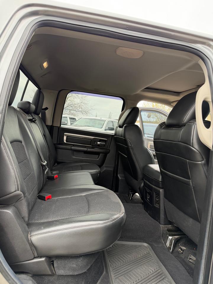 2013 RAM 1500 4WD Crew Cab 140.5" Sport 5.7L V8 Photo