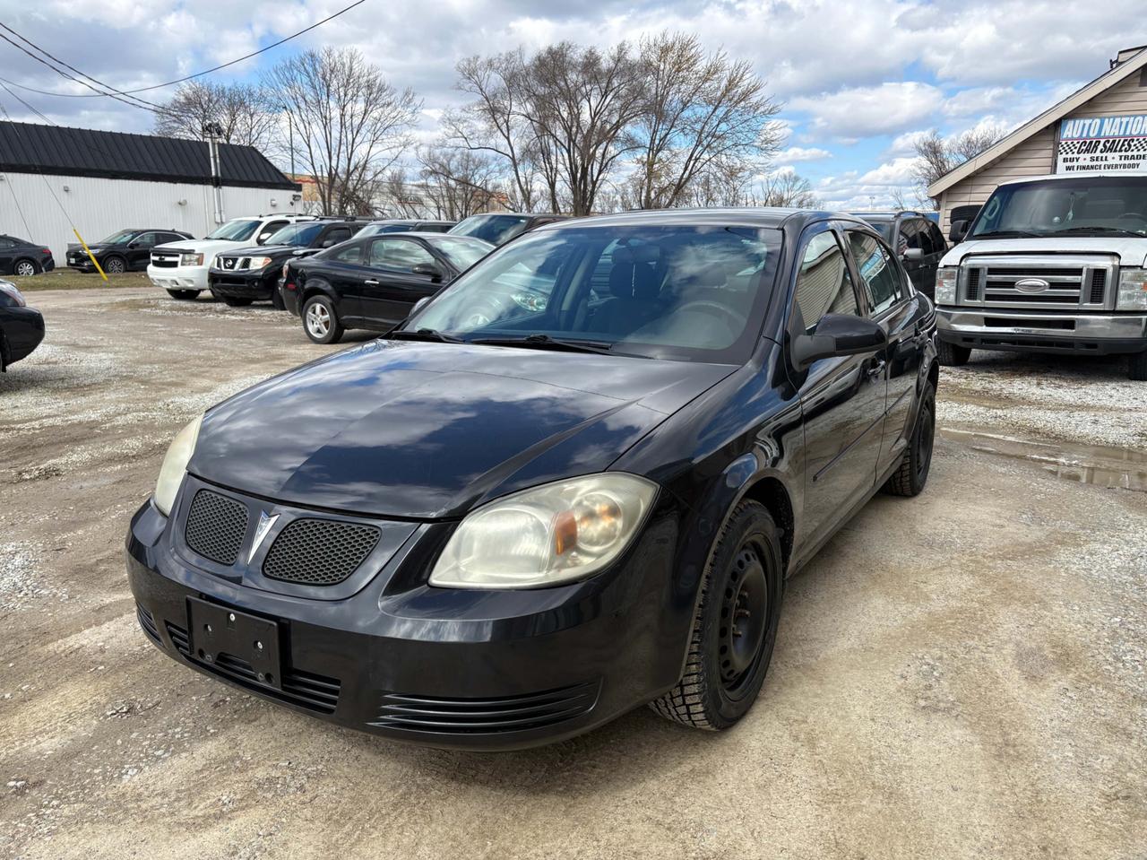 2010 Pontiac G5 SE 4X4 - Safety Included and 1-Year Powertrain Warranty Photo2