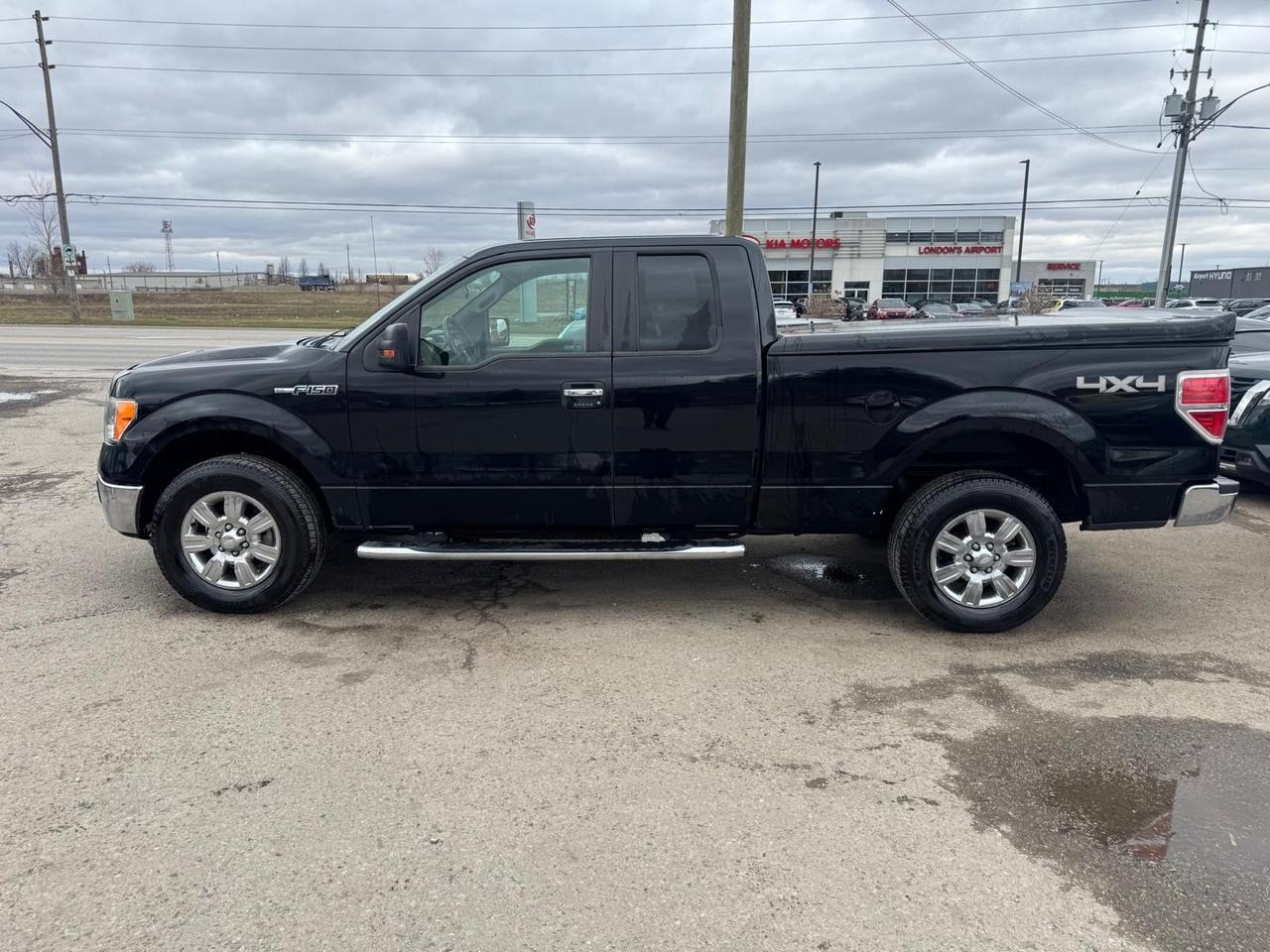 2009 Ford F-150 XLT, 5.4 V8, WELL MAINTAINED, 4X4, TOPPER, CERT Photo