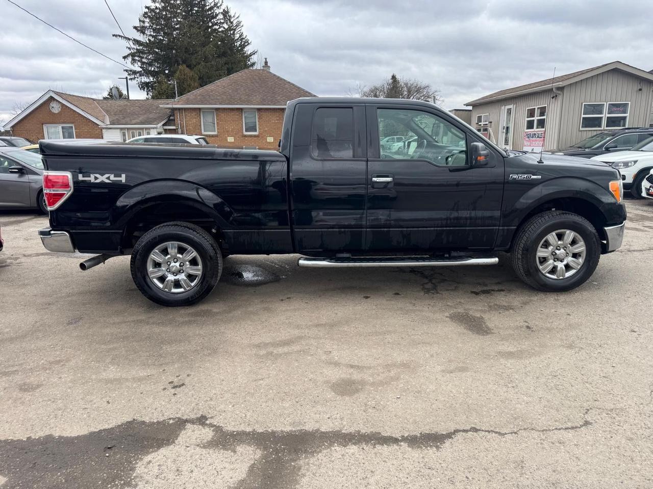 2009 Ford F-150 XLT, 5.4 V8, WELL MAINTAINED, 4X4, TOPPER, CERT Photo