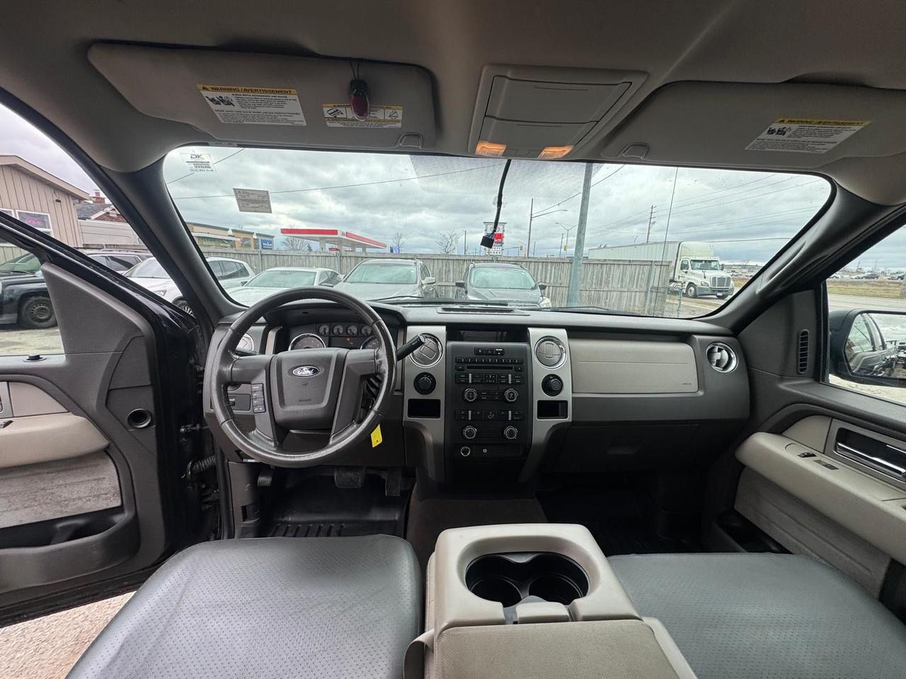 2009 Ford F-150 XLT, 5.4 V8, WELL MAINTAINED, 4X4, TOPPER, CERT Photo