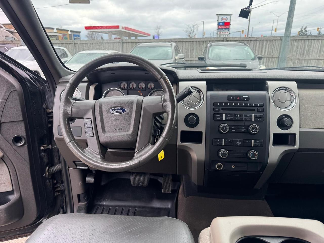 2009 Ford F-150 XLT, 5.4 V8, WELL MAINTAINED, 4X4, TOPPER, CERT Photo