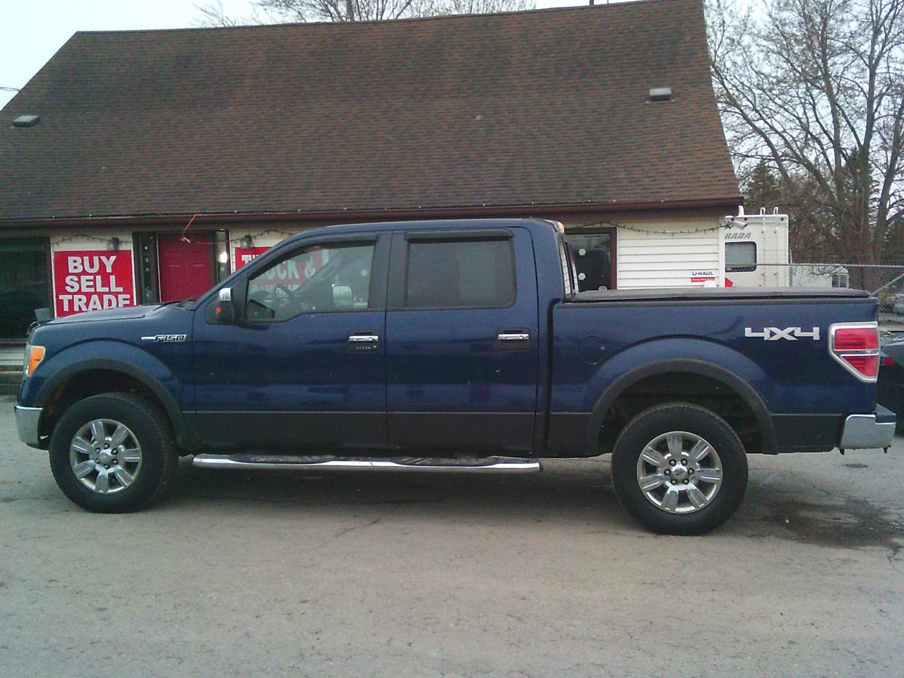 2009 Ford F-150 4WD Supercrew 145 XLT Photo4