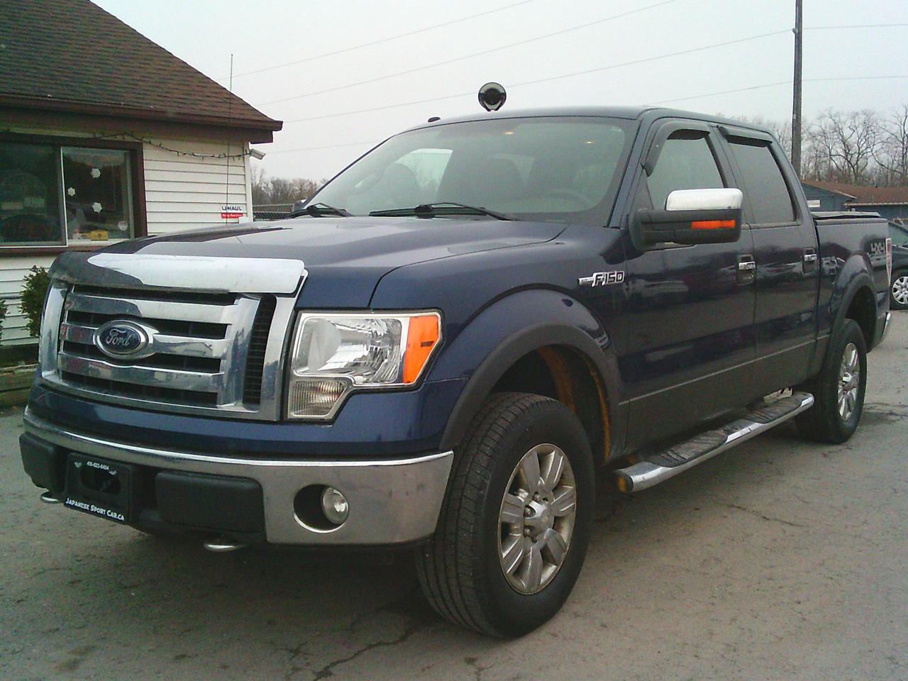 2009 Ford F-150 4WD Supercrew 145 XLT Photo