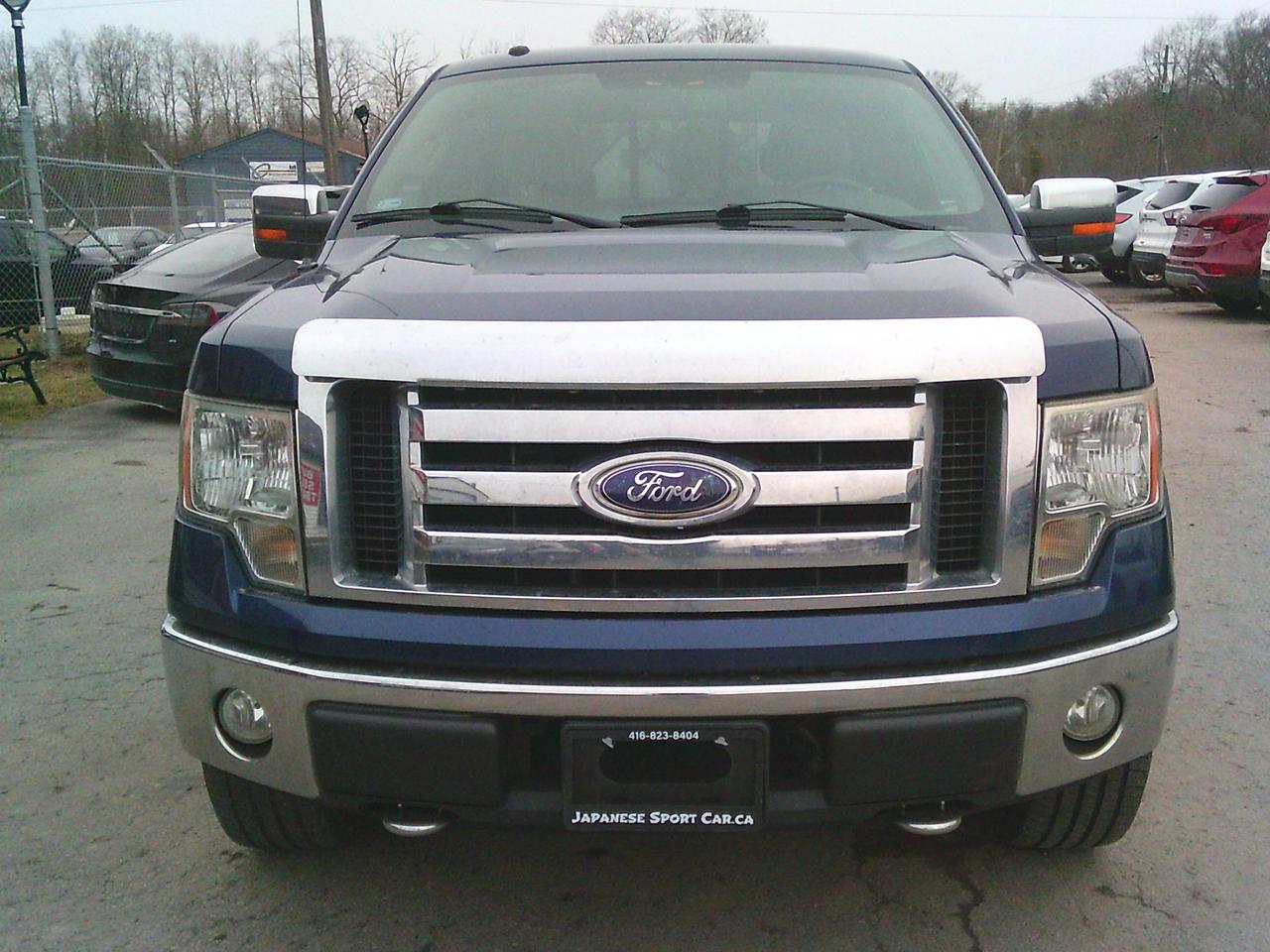 2009 Ford F-150 4WD Supercrew 145 XLT Photo