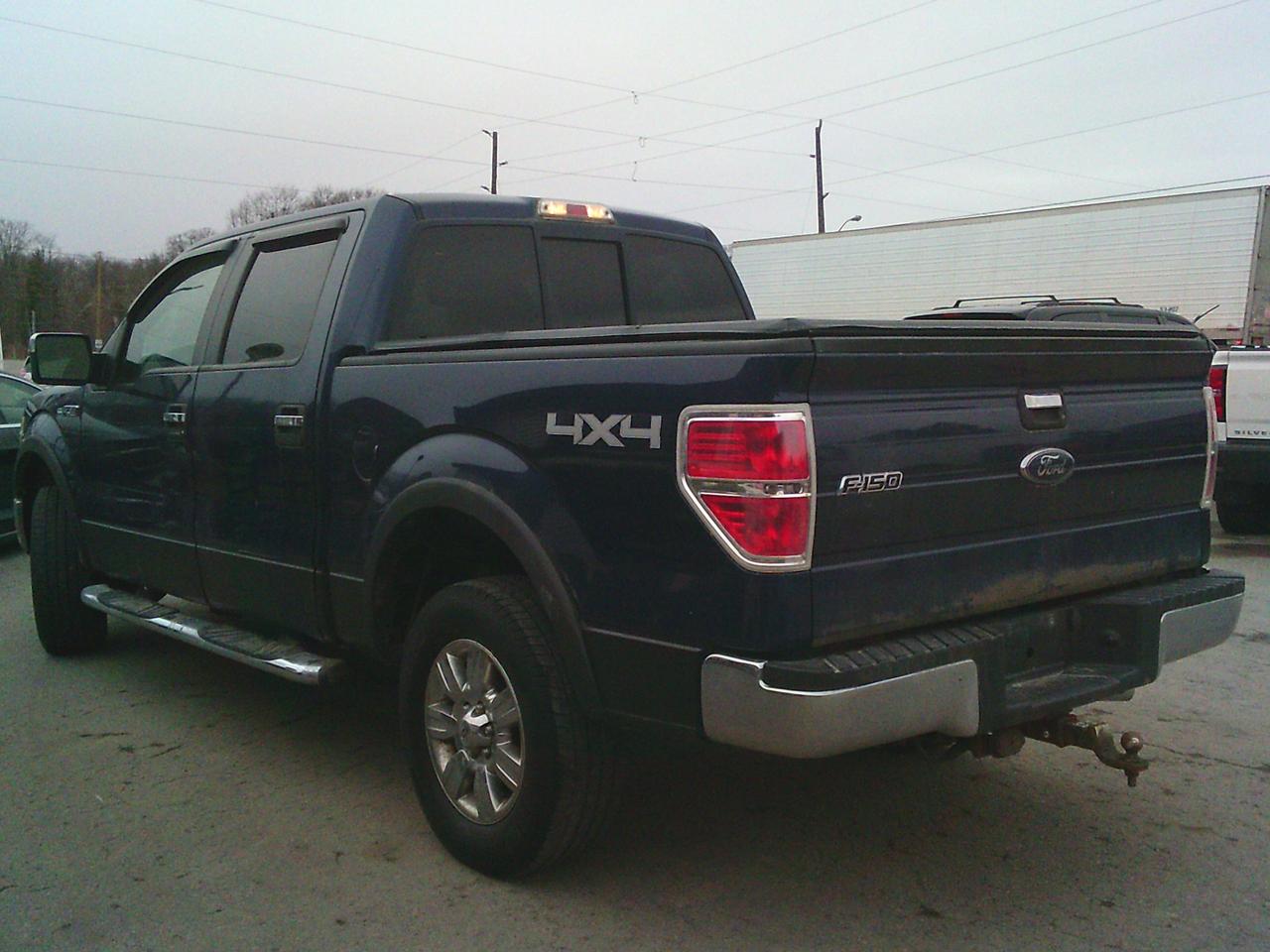 2009 Ford F-150 4WD Supercrew 145 XLT Photo