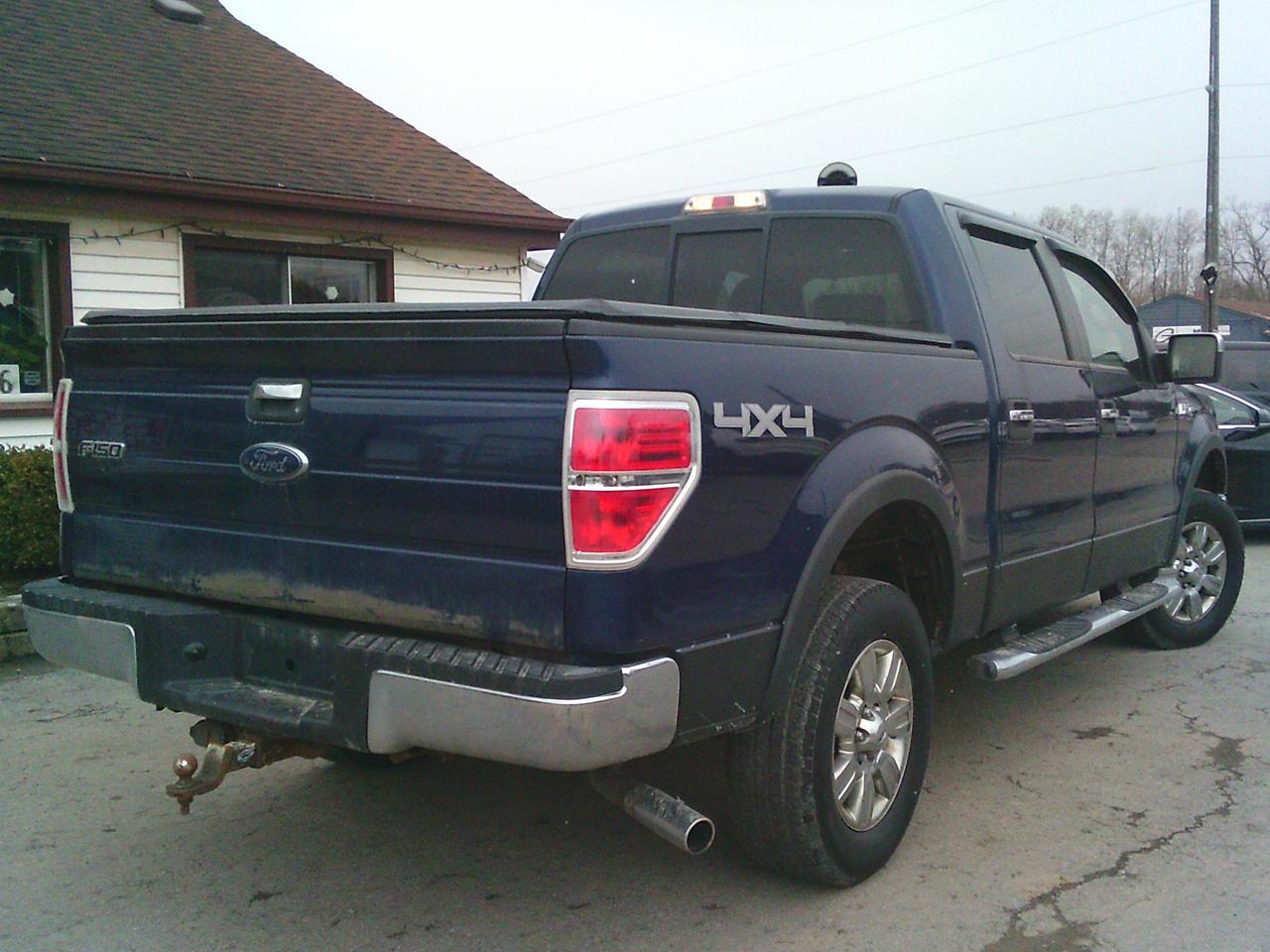 2009 Ford F-150 4WD Supercrew 145 XLT Photo