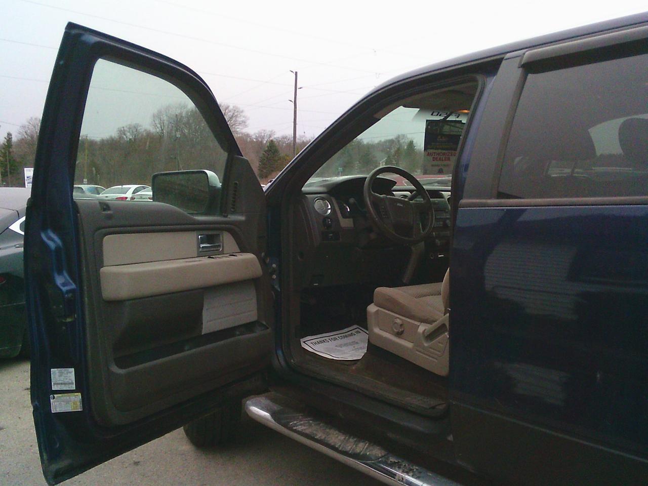 2009 Ford F-150 4WD Supercrew 145 XLT Photo