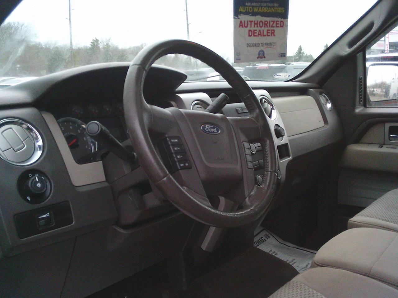 2009 Ford F-150 4WD Supercrew 145 XLT Photo