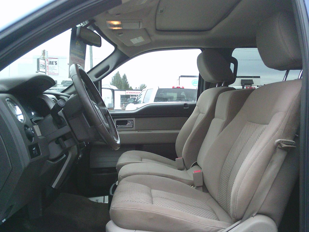 2009 Ford F-150 4WD Supercrew 145 XLT Photo