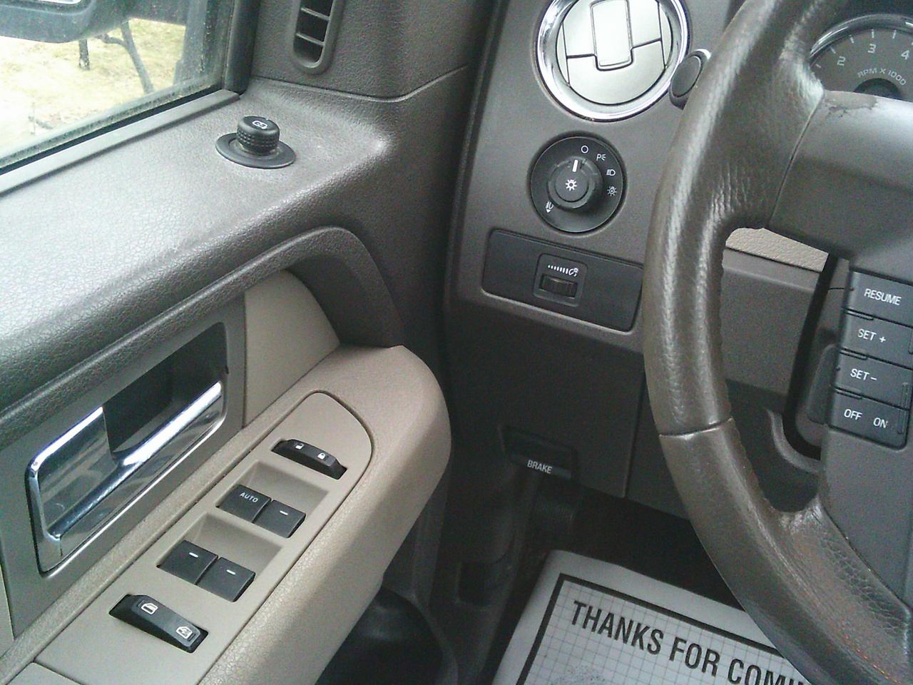 2009 Ford F-150 4WD Supercrew 145 XLT Photo