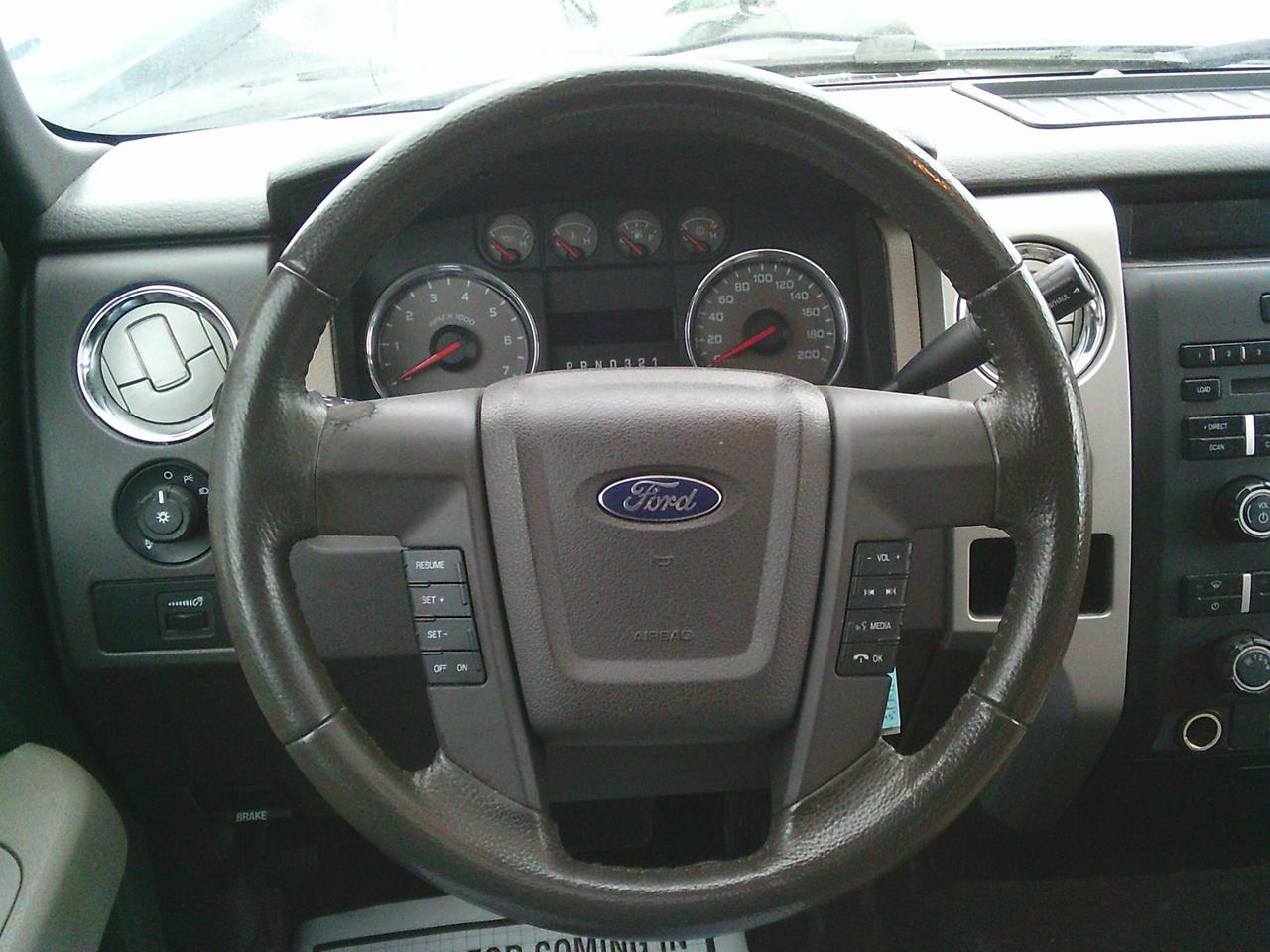 2009 Ford F-150 4WD Supercrew 145 XLT Photo