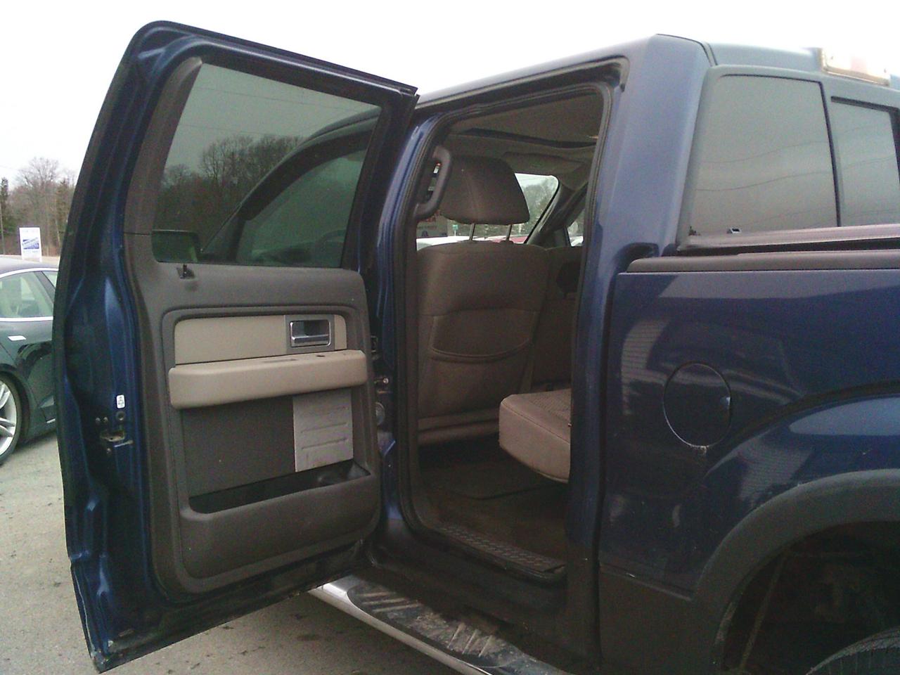 2009 Ford F-150 4WD Supercrew 145 XLT Photo