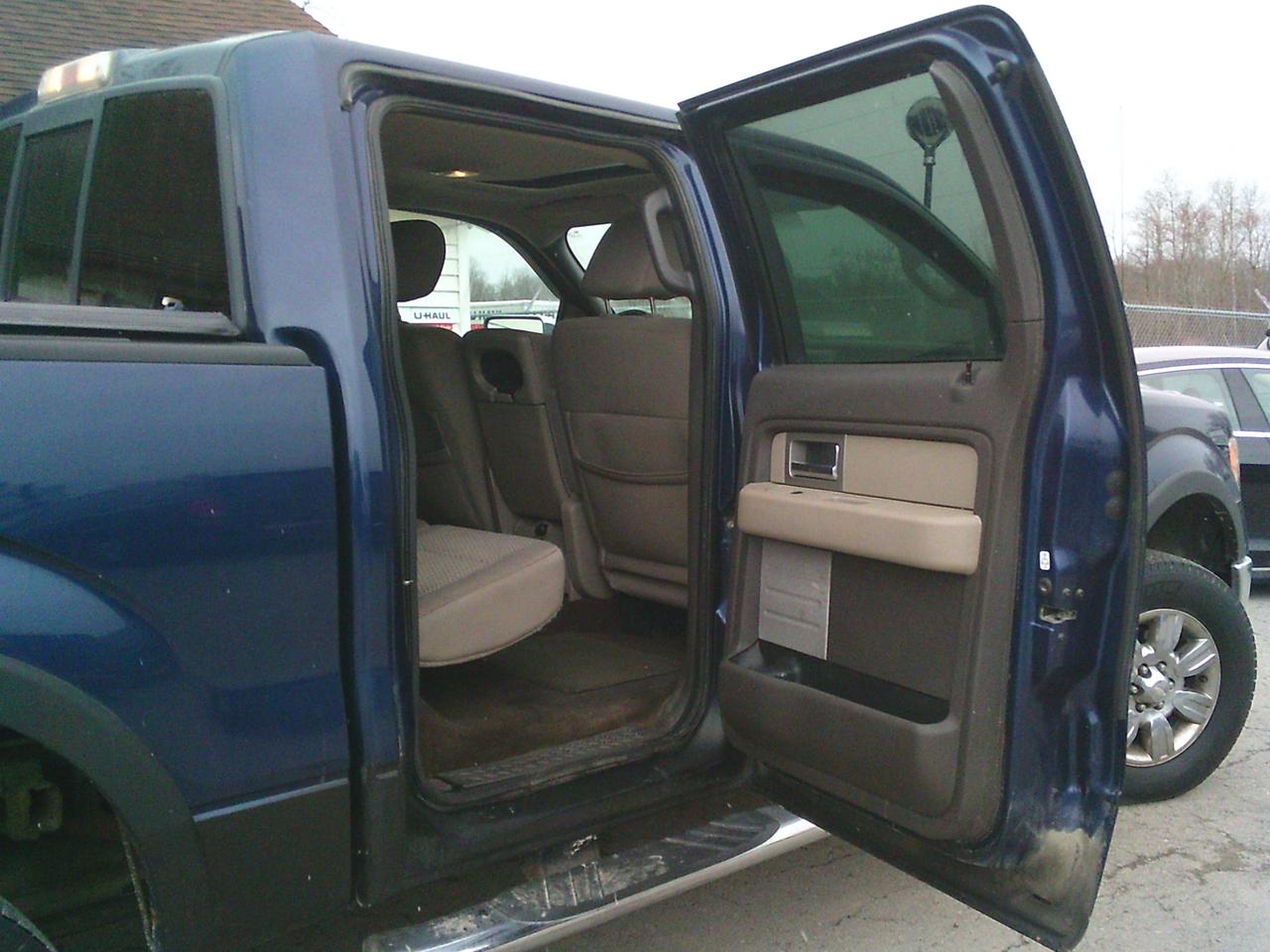 2009 Ford F-150 4WD Supercrew 145 XLT Photo