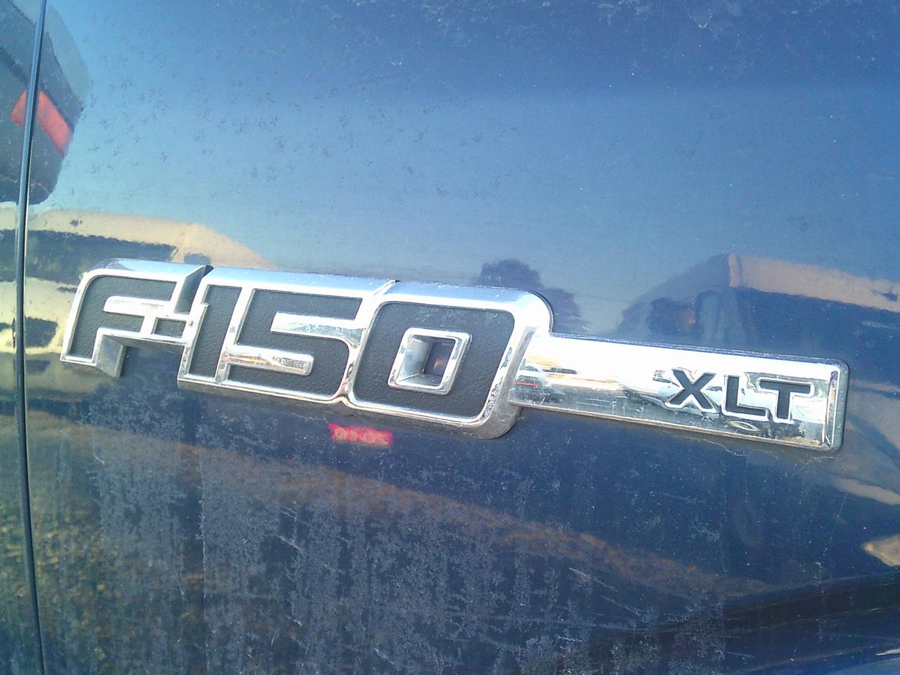 2009 Ford F-150 4WD Supercrew 145 XLT Photo