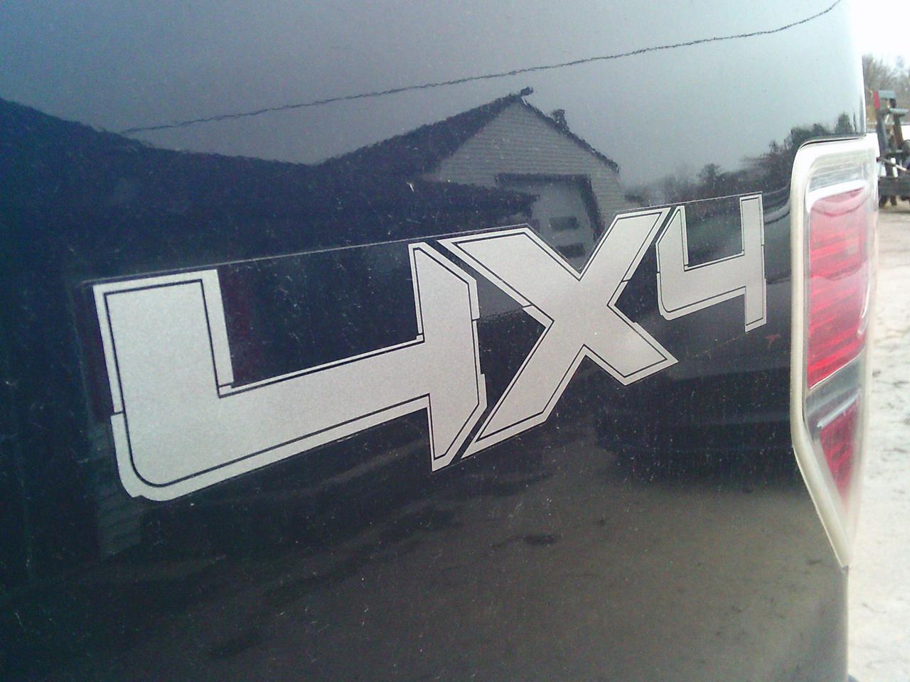 2009 Ford F-150 4WD Supercrew 145 XLT Photo