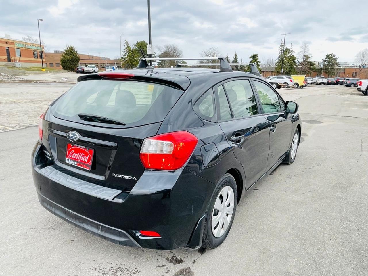 2014 Subaru Impreza 2.0i 4dr All-wheel Drive Sedan CVT Photo3