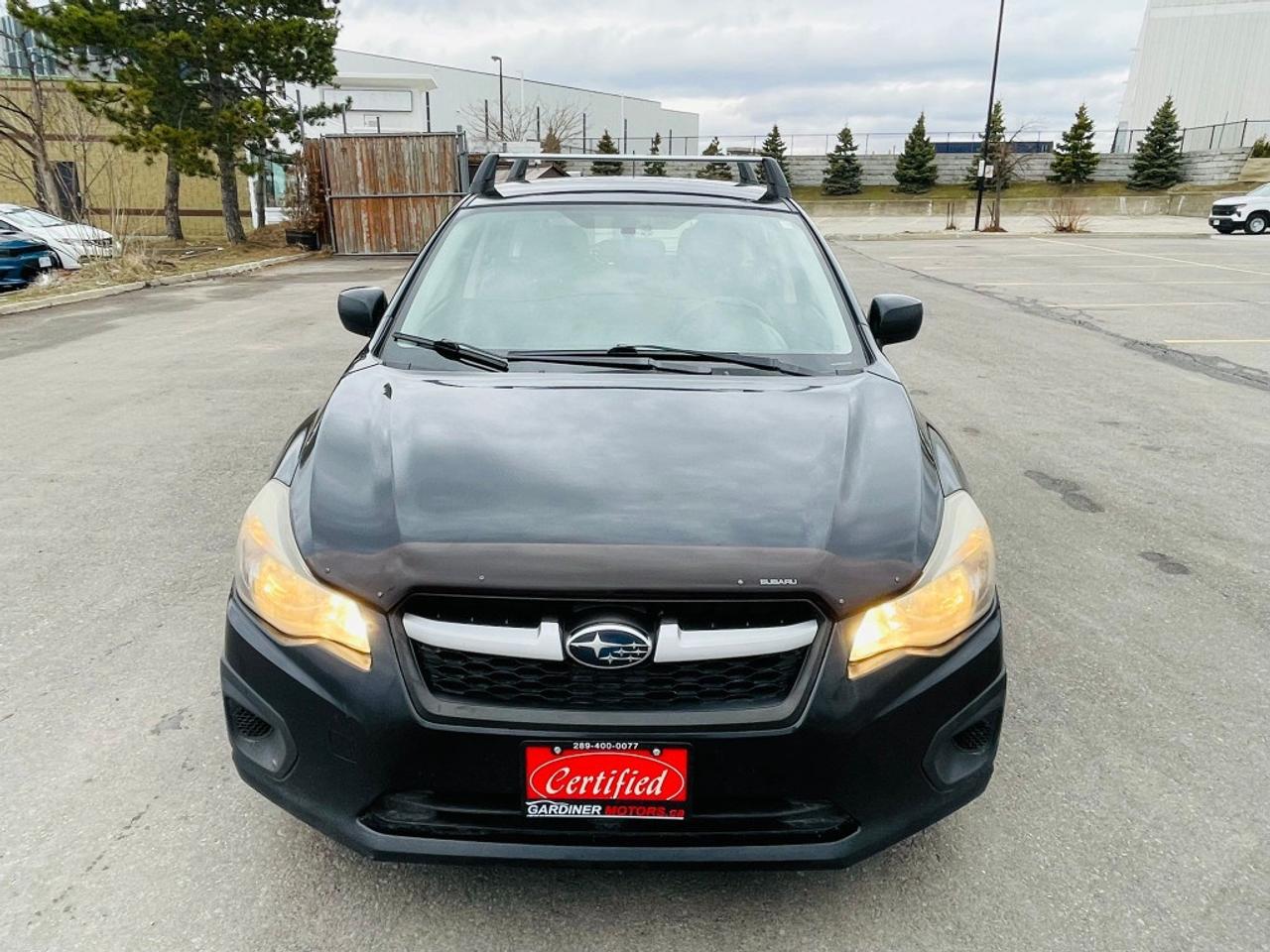 2014 Subaru Impreza 2.0i 4dr All-wheel Drive Sedan CVT Photo