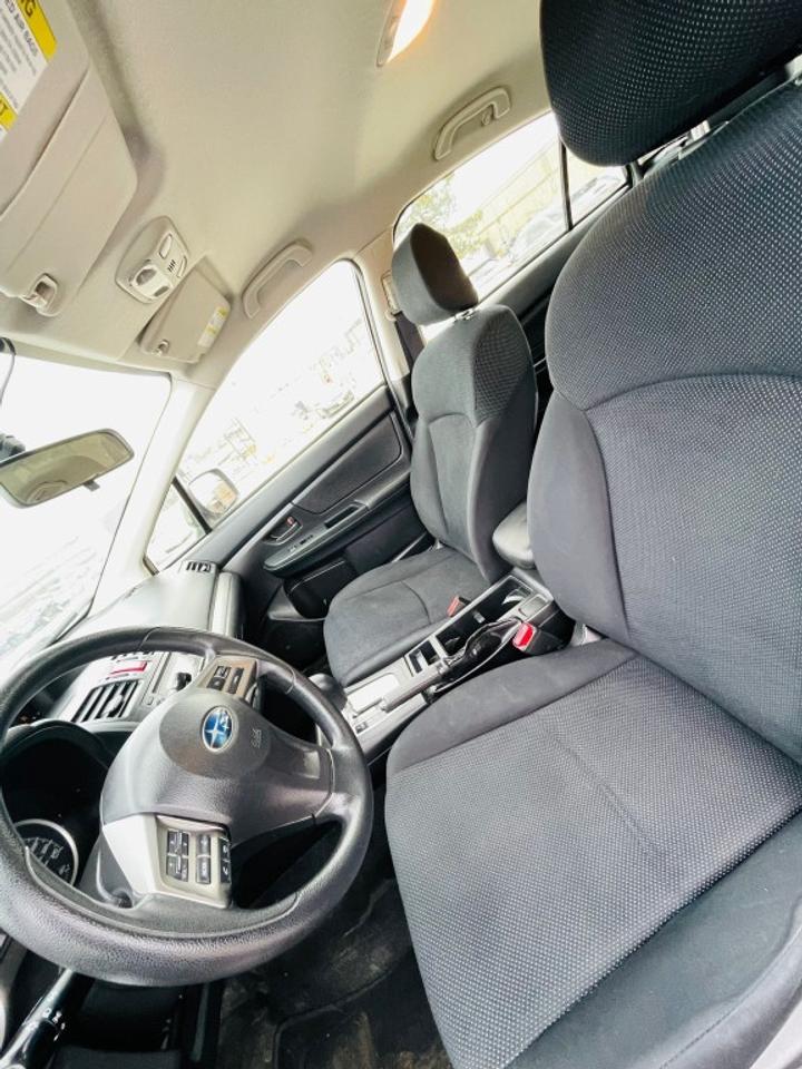 2014 Subaru Impreza 2.0i 4dr All-wheel Drive Sedan CVT Photo