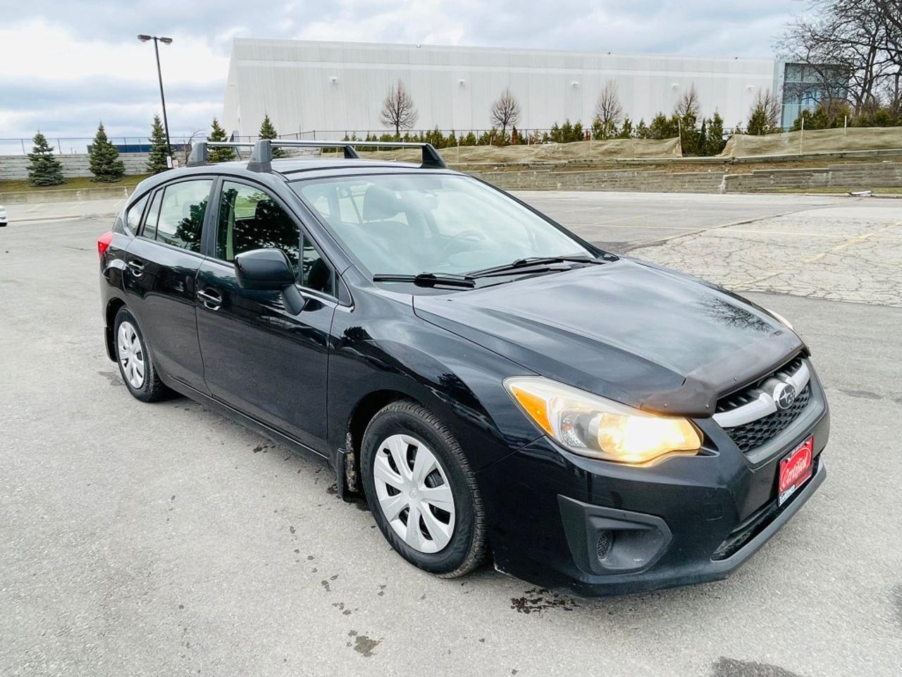 2014 Subaru Impreza 2.0i 4dr All-wheel Drive Sedan CVT Photo