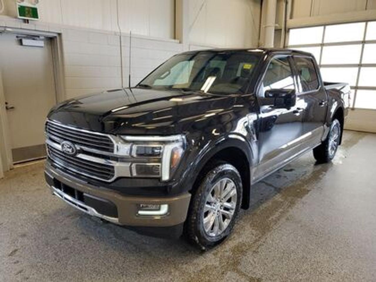 The all-new 2026 Ford F-150 King Ranch is presented in Agate Black Metallic. Under the hood, it features the 3.5L EcoBoost engine, delivering an impressive 400 horsepower and 500 lb-ft of torque. Paired with a 10-speed automatic transmission, this truck provides both efficiency and power, achieving a combined fuel economy of 12.3L/100km (23 miles per gallon). 

Key Features:
Power-Deployable Running Boards
Unique Genuine Wood Interior Trim Accents
Heated Rear Seats
Heated Leather Wrapped Steering Wheel
Bed Utility Package
BlueCruise
Power Tilt/Telescoping with Memory Steering Column
Tow/Haul Package
Power Tilt/Telescopic Steering Column
14 Speaker B&O Sound System
Mobile Office Package
Engine Block Heater
Twin Panel Moonroof
FX4 Off Road Package

Moose Jaw Ford, conveniently located at 1010 North Service Road in Moose Jaw, is your trusted destination for all your automotive needs. With an impressive 4.8-star Google rating from nearly 1,500 reviews, we are proud to deliver an exceptional vehicle-buying experience tailored just for you. Our Moose Jaw Motives set us apart, offering unbeatable value like half-priced oil changes for life on pre-owned vehicles, one year of key and remote protection, and one year of tire and rim protection. Enjoy peace of mind with every purchase. At Moose Jaw Ford, were committed to driving positive change in our community by combining exceptional service, high-quality vehicles, and a guest-first approach. Visit us today!