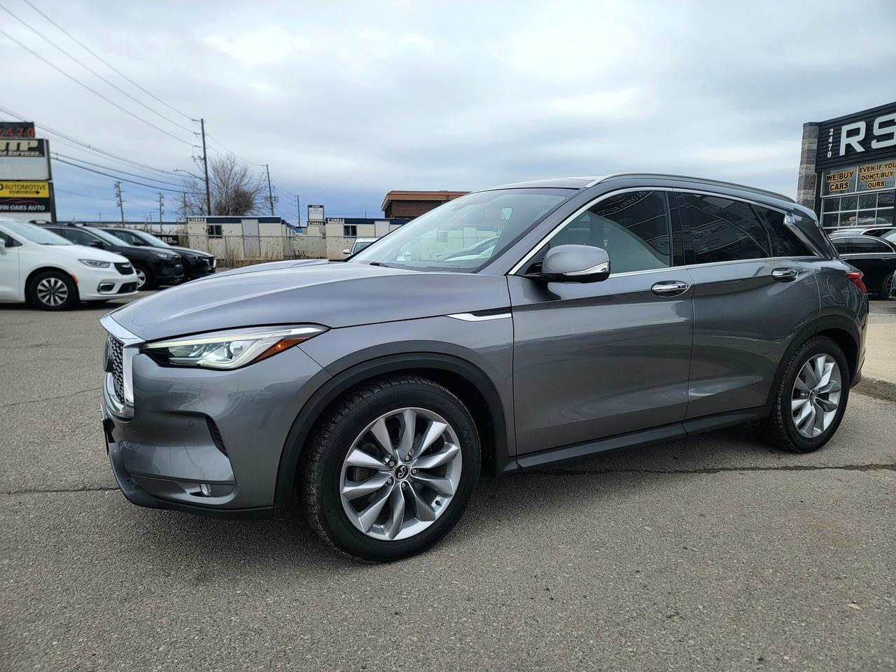 <h2 data-section-id=1pt91va data-start=0 data-end=66>2019 INFINITI QX50 ESSENTIAL AWD &mdash; Turbo Luxury, Tech & Comfort</h2><p data-start=68 data-end=425>Elegant, refined, and packed with advanced engineering, this 2019 INFINITI QX50 ESSENTIAL AWD delivers premium luxury with sporty performance. Powered by INFINITI&rsquo;s innovative VC-Turbo engine and equipped with intelligent all-wheel drive, it offers a smooth, confident ride in all conditions while surrounding you with upscale comfort and modern technology.</p><p data-start=427 data-end=569>Perfect for commuting, road trips, or family duty &mdash; this QX50 strikes the ideal balance between luxury SUV practicality and driving enjoyment.</p><h3 data-section-id=mzdsug data-start=571 data-end=599>Performance & Capability</h3><ul data-start=600 data-end=832><li data-section-id=480f7w data-start=600 data-end=662><p data-start=602 data-end=662>2.0L VC-Turbo 4-cylinder engine (Variable Compression Turbo)</p></li><li data-section-id=19i6fyw data-start=663 data-end=687><p data-start=665 data-end=687>Intelligent AWD system</p></li><li data-section-id=6krvho data-start=688 data-end=741><p data-start=690 data-end=741>XTRONIC CVT automatic transmission with manual mode</p></li><li data-section-id=1ne5w6j data-start=742 data-end=788><p data-start=744 data-end=788>Drive Mode Selector (Standard / Eco / Sport)</p></li><li data-section-id=8yethc data-start=789 data-end=832><p data-start=791 data-end=832>Smooth, quiet, fuel-efficient performance</p></li></ul><h3 data-section-id=15v4la data-start=834 data-end=856>Interior & Comfort</h3><ul data-start=857 data-end=1119><li data-section-id=1vec395 data-start=857 data-end=884><p data-start=859 data-end=884>Leather-appointed seating</p></li><li data-section-id=1v53xb3 data-start=885 data-end=911><p data-start=887 data-end=911>Power heated front seats</p></li><li data-section-id=1jfn8mm data-start=912 data-end=962><p data-start=914 data-end=962>Dual-screen INFINITI InTouch infotainment system</p></li><li data-section-id=tegf2t data-start=963 data-end=999><p data-start=965 data-end=999>Tri-zone automatic climate control</p></li><li data-section-id=3c7o0n data-start=1000 data-end=1016><p data-start=1002 data-end=1016>Power liftgate</p></li><li data-section-id=2wc3f0 data-start=1017 data-end=1072><p data-start=1019 data-end=1072>Spacious rear seating with sliding/reclining function</p></li><li data-section-id=1j5nqc1 data-start=1073 data-end=1119><p data-start=1075 data-end=1119>Generous cargo space with folding rear seats</p></li></ul><h3 data-section-id=1123qwt data-start=1121 data-end=1149>Technology & Convenience</h3><ul data-start=1150 data-end=1383><li data-section-id=1ljdrk7 data-start=1150 data-end=1169><p data-start=1152 data-end=1169>Navigation system</p></li><li data-section-id=8ofp3r data-start=1170 data-end=1205><p data-start=1172 data-end=1205>Around View Monitor (360&deg; camera)</p></li><li data-section-id=vo0q9y data-start=1206 data-end=1236><p data-start=1208 data-end=1236>Front & rear parking sensors</p></li><li data-section-id=5gmuw5 data-start=1237 data-end=1275><p data-start=1239 data-end=1275>Keyless entry with push-button start</p></li><li data-section-id=1fgoreq data-start=1276 data-end=1297><p data-start=1278 data-end=1297>Remote engine start</p></li><li data-section-id=1xpfmsb data-start=1298 data-end=1338><p data-start=1300 data-end=1338>Bluetooth hands-free & audio streaming</p></li><li data-section-id=12kobt4 data-start=1339 data-end=1383><p data-start=1341 data-end=1383>Apple CarPlay & Android Auto compatibility</p></li></ul><h3 data-section-id=140s63o data-start=1385 data-end=1415>Safety & Driver Assistance</h3><ul data-start=1416 data-end=1602><li data-section-id=18gusif data-start=1416 data-end=1436><p data-start=1418 data-end=1436>Blind Spot Warning</p></li><li data-section-id=kcg7ip data-start=1437 data-end=1463><p data-start=1439 data-end=1463>Rear Cross Traffic Alert</p></li><li data-section-id=oeun1c data-start=1464 data-end=1491><p data-start=1466 data-end=1491>Forward Emergency Braking</p></li><li data-section-id=w7ejsg data-start=1492 data-end=1516><p data-start=1494 data-end=1516>Lane Departure Warning</p></li><li data-section-id=c081ec data-start=1517 data-end=1569><p data-start=1519 data-end=1569>High-strength body structure with multiple airbags</p></li><li data-section-id=j7hsrz data-start=1570 data-end=1602><p data-start=1572 data-end=1602>Excellent crash safety ratings</p></li></ul><h3 data-section-id=1uo1hrj data-start=1604 data-end=1627>Exterior Highlights</h3><ul data-start=1628 data-end=1755><li data-section-id=p6qyuf data-start=1628 data-end=1667><p data-start=1630 data-end=1667>Signature INFINITI double-arch grille</p></li><li data-section-id=25c7s5 data-start=1668 data-end=1709><p data-start=1670 data-end=1709>LED headlights & daytime running lights</p></li><li data-section-id=ulf04f data-start=1710 data-end=1724><p data-start=1712 data-end=1724>Alloy wheels</p></li><li data-section-id=1w6ilnm data-start=1725 data-end=1755><p data-start=1727 data-end=1755>Sleek, modern luxury styling</p></li></ul><p>A sophisticated compact luxury SUV that offers strong performance, advanced safety, and premium comfort &mdash; without the premium new-car price.</p><p>&nbsp;</p><p><strong>Additional Certification Cost</strong>: The full certification cost for this vehicle is <strong>$790 + HST</strong>.</p><p><strong>What&rsquo;s Included with Certification</strong>:</p><ul><li>The vehicle will be delivered with a <strong>valid safety certification</strong> and a <strong>36-day safety item warranty</strong> for your peace of mind.</li><li>A <strong>fresh oil change</strong> will be performed, and all fluids will be topped up.</li><li>The vehicle will be <strong>professionally detailed</strong>, ensuring it looks and feels like new when you pick it up.</li></ul><p>At <strong>Twin Oaks Auto</strong>, we are committed to providing a <strong>hassle-free car buying experience</strong>. From your first inquiry to driving off in your new car, our goal is to get you on the road quickly and stress-free!</p><p><strong>Financing Options Available!</strong><br>Flexible financing options are available to suit your needs. Contact us for more details.</p><p><strong>Contact Us Today</strong>:<br>📞 <strong>Call Us</strong>: 905-339-3330<br>📍 <strong>Location</strong>: 2470 Royal Windsor Drive, Oakville, Ontario, L6J 7Y2</p><p><br>(Conveniently located between Ford Drive and Winston Churchill Blvd.)</p><p><strong>More Information</strong>:<br>Visit our website at <strong><a href=http://www.twinoaksauto.com>TwinOaksAuto.com</a></strong> to view additional pictures, explore our inventory, and access CARFAX reports.</p><p>&nbsp;</p>