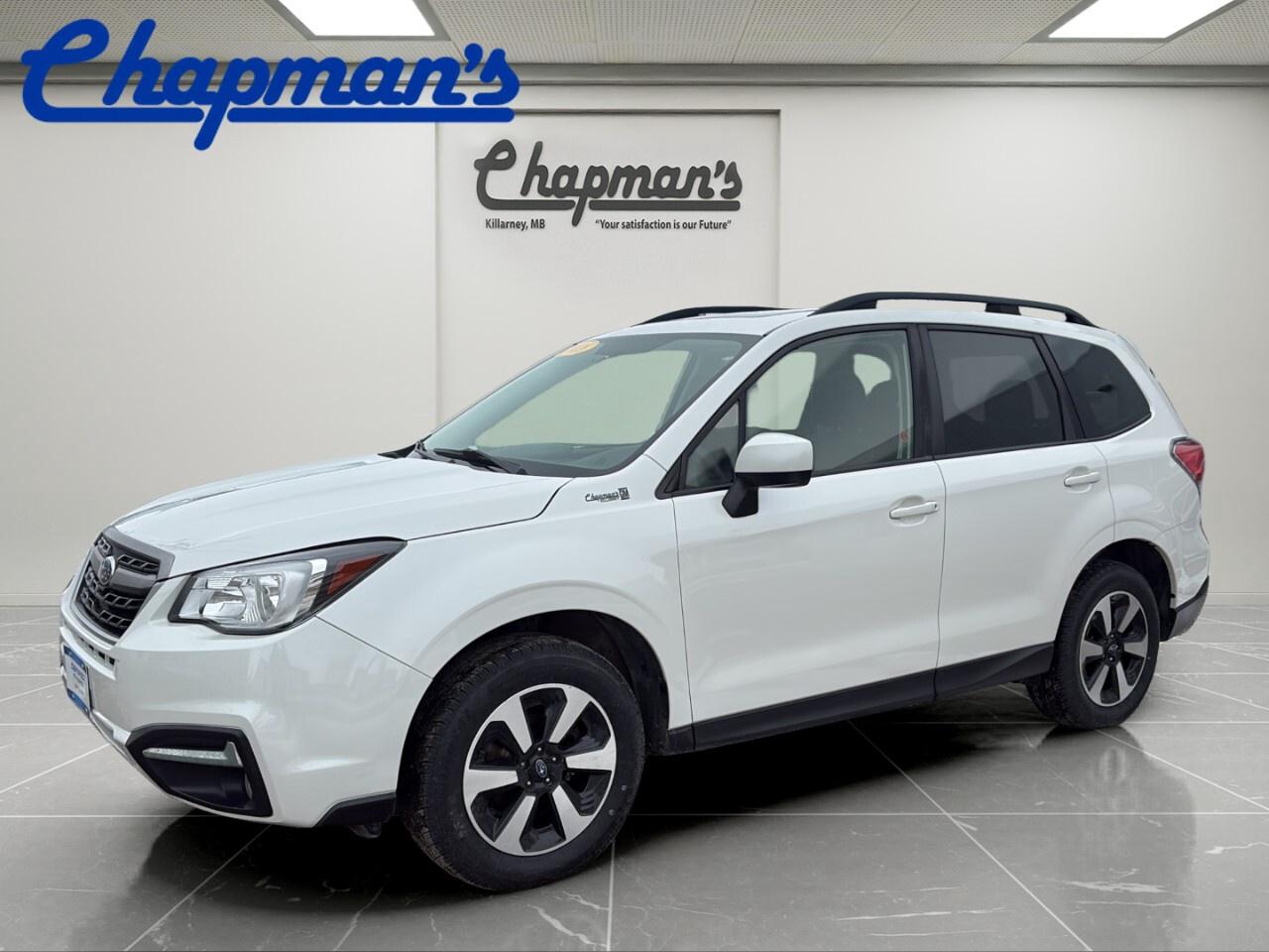 The 2018 Subaru Forester 2.5i Touring Cvt is a smart choice for drivers in Killarney who want confidence, comfort, and everyday versatility. Finished in White with a Black interior, this used SUV offers all-wheel drive, a 2.5 L engine, automatic transmission, and 77,996 km on the odometer. At Chapman Chevrolet Buick GMC, this Forester delivers the practical design and solid capability that have made Subaru a trusted name for Canadian driving.

The 2018 Subaru Forester 2.5i Touring Cvt is well suited to busy weekdays, weekend trips, and changing road conditions. Its four-door layout makes entry easy for passengers, while the elevated ride height helps provide a clear view of the road. With useful features already equipped, this Forester brings value and confidence together in one well-rounded package.

FEATURES OF THE Forester 2.5i Touring Cvt

»» Power sunroof adds light and openness
»» All-wheel drive supports year-round traction
»» Automatic transmission delivers smooth daily driving
»» 2.5 L engine balances power efficiency

ADVANCED SAFETY FEATURES

»» Backup camera helps with reversing visibility
»» Traction support adds control on roads
»» Four-door design aids safe passenger access
»» Subaru engineering focuses on driver confidence

PERFORMANCE AND EFFICIENCY

»» 2.5 L engine offers steady response
»» Automatic transmission supports smooth acceleration
»» All-wheel drive improves grip in weather
»» Balanced performance for city highway travel

COMFORT AND CONVENIENCE

»» Heated seats help on cold mornings
»» Power adjustable seats add driving comfort
»» Front air conditioning cools the cabin
»» Power windows offer simple daily convenience

TECHNOLOGY AND CONNECTIVITY

»» Bluetooth integration supports hands-free calling
»» Satellite radio expands entertainment choices
»» Smart device integration keeps devices connected
»» Keyless entry adds everyday ease

CARGO SPACE

»» Versatile SUV shape supports daily hauling
»» Rear cargo area suits errands
»» Four doors simplify loading passengers easily
»» Practical layout handles gear and groceries

AWARDS & RECOGNITIONS

»» Top Safety Pick Plus, Insurance Institute for Highway Safety, 2018
»» Best Compact Utility Vehicle, The Car Guide, 2018

WHAT OTHER OWNERS LIKE

»» Confident all-wheel drive in poor weather
»» Good outward visibility for daily driving
»» Comfortable ride for commuting and trips
»» Practical size with useful cargo flexibility

This 2018 Subaru Forester 2.5i Touring Cvt stands out with the features drivers use most. Cruise control helps make longer drives more relaxing, while alloy wheels add a clean, upscale look. The sunroof brings fresh air and natural light into the cabin, and the backup camera helps make parking and reversing easier in tight spots.

This used Subaru also offers the convenience modern drivers want. Bluetooth integration and smart device integration help keep you connected on the move, while satellite radio gives you more ways to enjoy every drive. Heated seats, front air conditioning, power windows, and keyless entry all add to the comfort and ease of ownership.

If you are shopping for a dependable compact SUV with proven Subaru capability, practical equipment, and a comfortable cabin, this 2018 Subaru Forester 2.5i Touring Cvt deserves a closer look. Visit Chapman Chevrolet Buick GMC in Killarney to explore this well-equipped Forester today.

This 2018 Subaru Forester 2.5i Touring Cvts VIN is: JF2SJEJC7JH449787.
