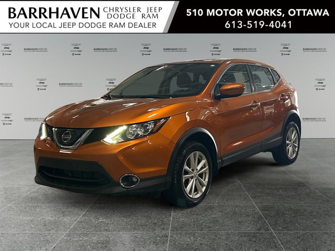 The 2018 Nissan Qashqai AWD SV is a dynamic SUV in a vibrant orange hue, fitted with an all-wheel-drive system that promises reliable handling across various terrains. Its sporty and practical design is complemented by newly installed tires, adding to both style and performance. Step inside to a comfortable haven with heated seats, perfect for those chilly Canadian mornings. The cabin is designed with functionality in mind, featuring power windows and keyless entry for your convenience. The alloy wheels add a touch of elegance, while the built-in backup camera aids in safe maneuvering. Technological features include Bluetooth connectivity, allowing you to keep in touch or play your favourite tunes with ease. The brake assist feature enhances safety, providing additional confidence on the road, and cruise control ensures a relaxed driving experience on longer journeys. This Qashqai is ideal for the modern driver seeking both style and practicality. Whether youre navigating through bustling city streets or exploring nature just outside the city, this SUV is equipped to handle it all. Get in touch with Barrhaven Jeep Dodge Chrysler Ram today for more information and to schedule a test drive.