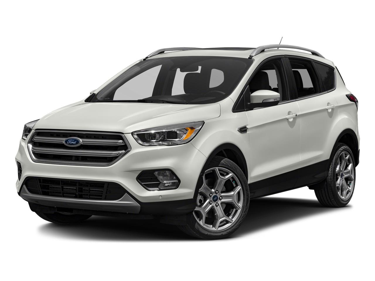 <p>Looking for a reliable and feature-packed SUV? Check out this used 2017 Ford Escape Titanium, available now at Fort Motors! This versatile crossover is ready for your next adventure, offering the perfect blend of comfort, technology, and capability. With its automatic transmission and 4-wheel drive, youll be prepared for any road condition, whether its a snowy winter day or a weekend getaway. This Escape Titanium has been well-maintained and has 99,834 KM on the odometer.</p>
<p>This Escape Titanium is loaded with features designed to enhance your driving experience. From the convenience of the power liftgate and back-up camera to the comfort of the heated leather steering wheel and dual-zone automatic climate control, this SUV has it all. The 2.0L EcoBoost engine provides a powerful and efficient ride, while the advanced safety features like the blind spot monitoring system and anti-lock brakes offer peace of mind on every journey.</p>
<p>Here are five standout features that make this 2017 Ford Escape Titanium a must-see:</p>
<ul>
<li><strong>Heated Leather Steering Wheel:</strong> Enjoy ultimate comfort during those chilly Canadian mornings.</li>
<li><strong>SYNC Services Mobile Hotspot Internet Access:</strong> Stay connected on the go with built-in Wi-Fi.</li>
<li><strong>Automatic Full-Time Four-Wheel Drive:</strong> Conquer any road condition with confidence.</li>
<li><strong>Power Liftgate Rear Cargo Access:</strong> Effortlessly load and unload your cargo.</li>
<li><strong>Blind Spot Monitoring:</strong> Enhance your safety on the road.</li>
</ul>
<p>Visit Fort Motors today to experience this exceptional Ford Escape Titanium for yourself!</p>
<p><strong><em>Powered by AutoIntelligence™</em></strong>
Vehicle information has been generated using artificial intelligence and is provided for informational purposes only. While efforts are made to ensure accuracy, please confirm all details directly with the dealer.</p>
