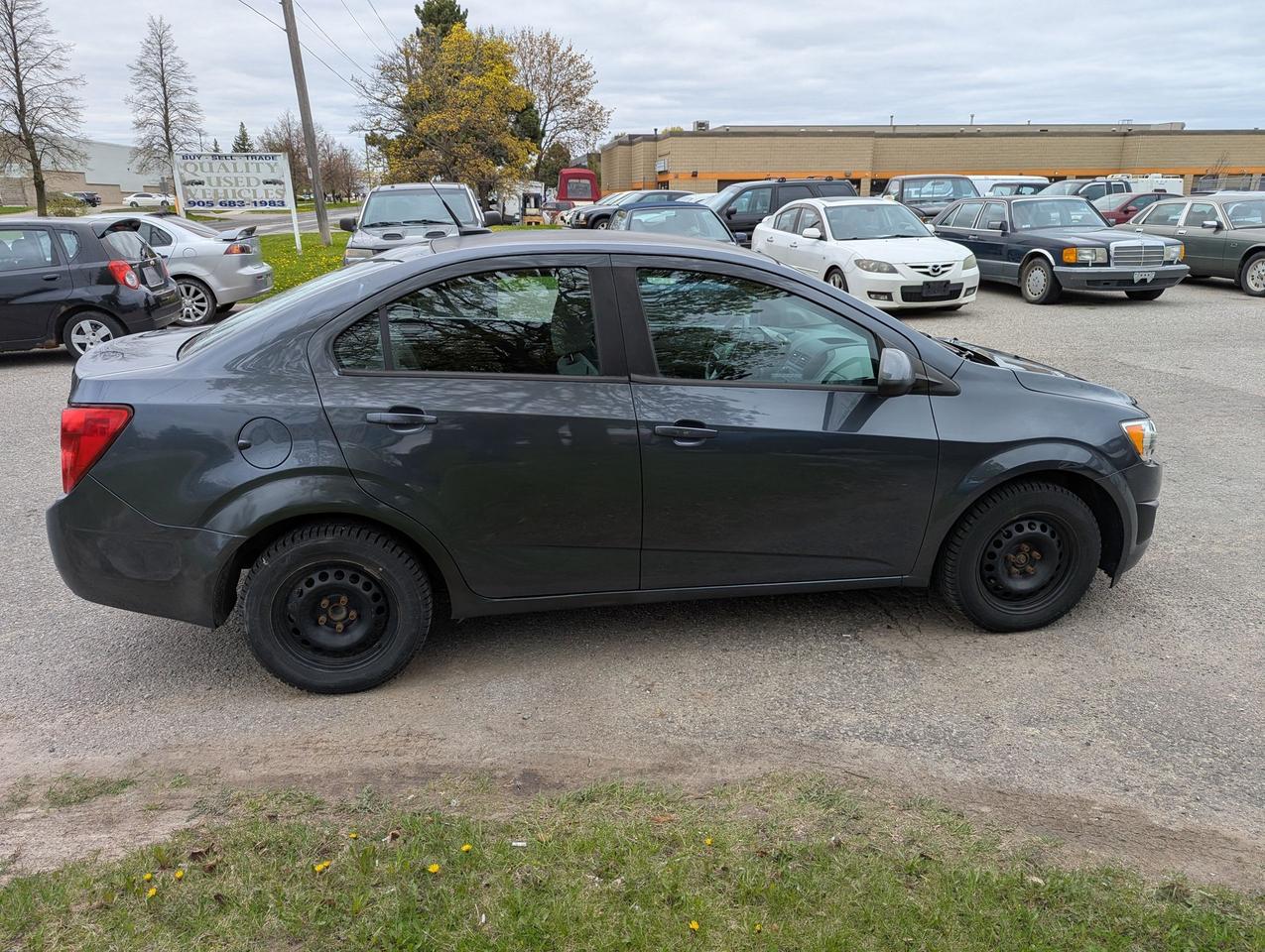 2013 Chevrolet Sonic "Gas MISER" certified + FREE 6M warranty Photo2