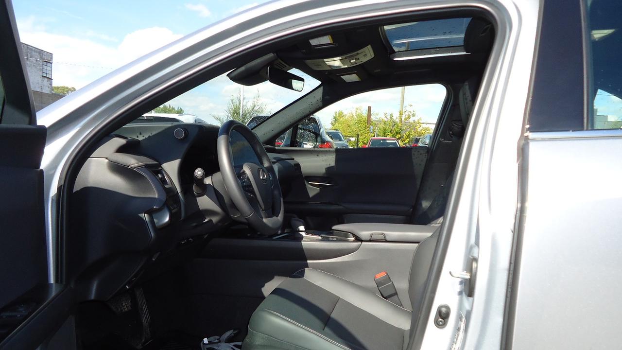 <p>Heres a fantastic opportunity to elevate your daily drive! Shaw Automotive Group is thrilled to present this virtually new 2025 Lexus UX 300h. This sleek, stylish compact SUV offers the perfect blend of luxury and efficiency, making every journey a pleasure. With a mere 2,000 kilometers on the odometer, this meticulously maintained UX 300h feels practically fresh off the assembly line. Experience the renowned Lexus build quality and innovative hybrid technology, all wrapped in a sophisticated package thats ready to turn heads.</p><p>Imagine yourself gliding effortlessly through city streets or confidently navigating challenging weather conditions, thanks to its responsive All-Wheel Drive system. The elegant grey exterior is perfectly complemented by a refined grey interior, creating a calming and comfortable environment for both driver and passengers. This UX 300h is more than just a car; its a statement about your appreciation for quality, innovation, and sustainable driving.</p><p>Here are a few standout features of this exceptional Lexus UX 300h:</p><ul><li><strong>Hybrid Efficiency:</strong> Experience incredible fuel economy without compromising on performance.</li><li><strong>All-Wheel Drive:</strong> Provides superior traction and handling in any weather.</li><li><strong>Lexus Luxury:</strong> Immerse yourself in premium materials and refined craftsmanship.</li><li><strong>Cutting-Edge Technology:</strong> Enjoy a suite of advanced features for entertainment and safety.</li><li><strong>Like-New Condition:</strong> Benefit from the reliability of a Lexus with exceptionally low mileage.</li></ul><p><strong><em>Powered by AutoIntelligence&trade;</em></strong> Vehicle information has been generated using artificial intelligence and is provided for informational purposes only. While efforts are made to ensure accuracy, please confirm all details directly with the dealer.</p>